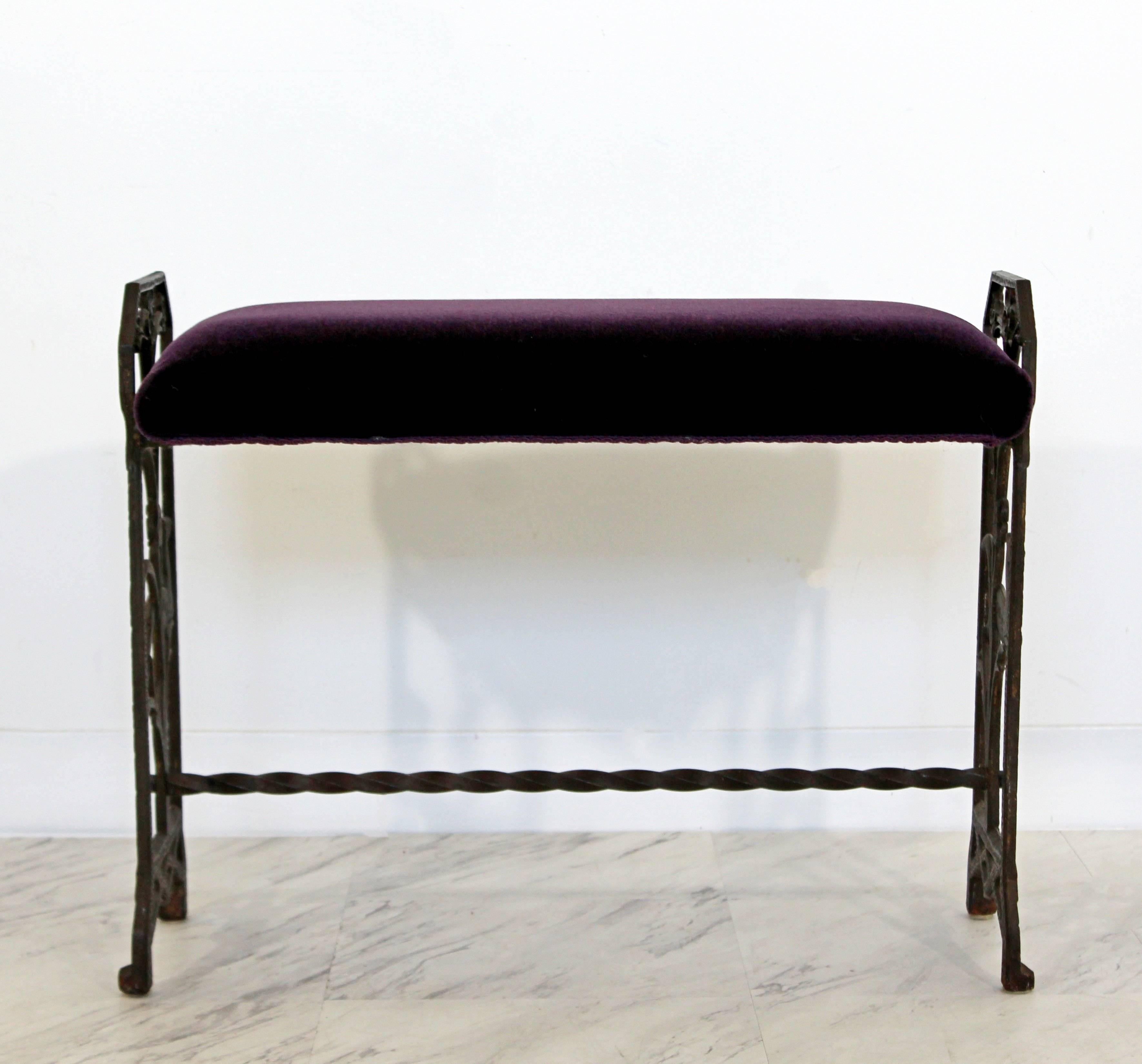 For your consideration is a stunning, wrought iron, Art Deco bench, with a dark purple velvet seat and beautifully detailed sides. In excellent condition. The dimensions are 25