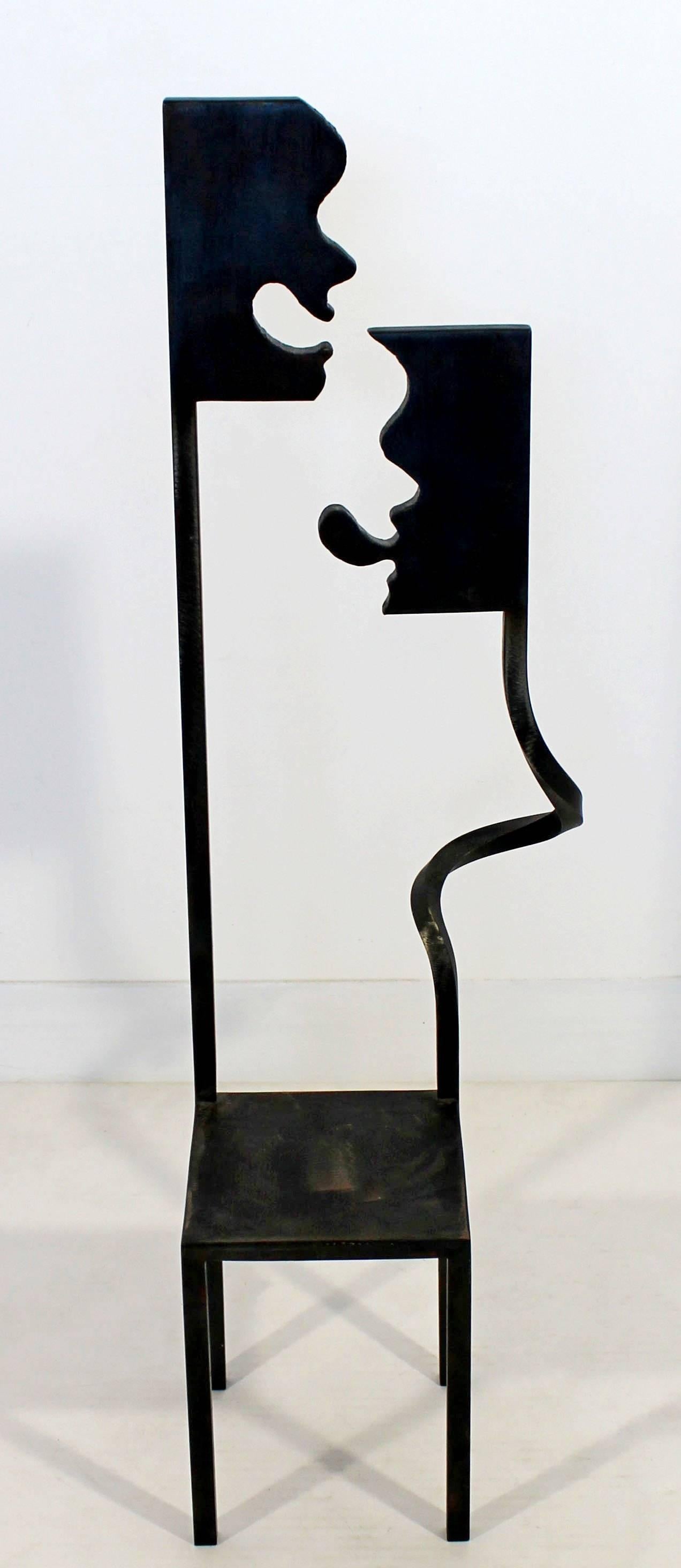 For your consideration is a whimsical, metal, floor sculpture of an artistic chair, signed and dated on the bottom by Gary Kulak, 1997. In excellent condition. The dimensions are 9