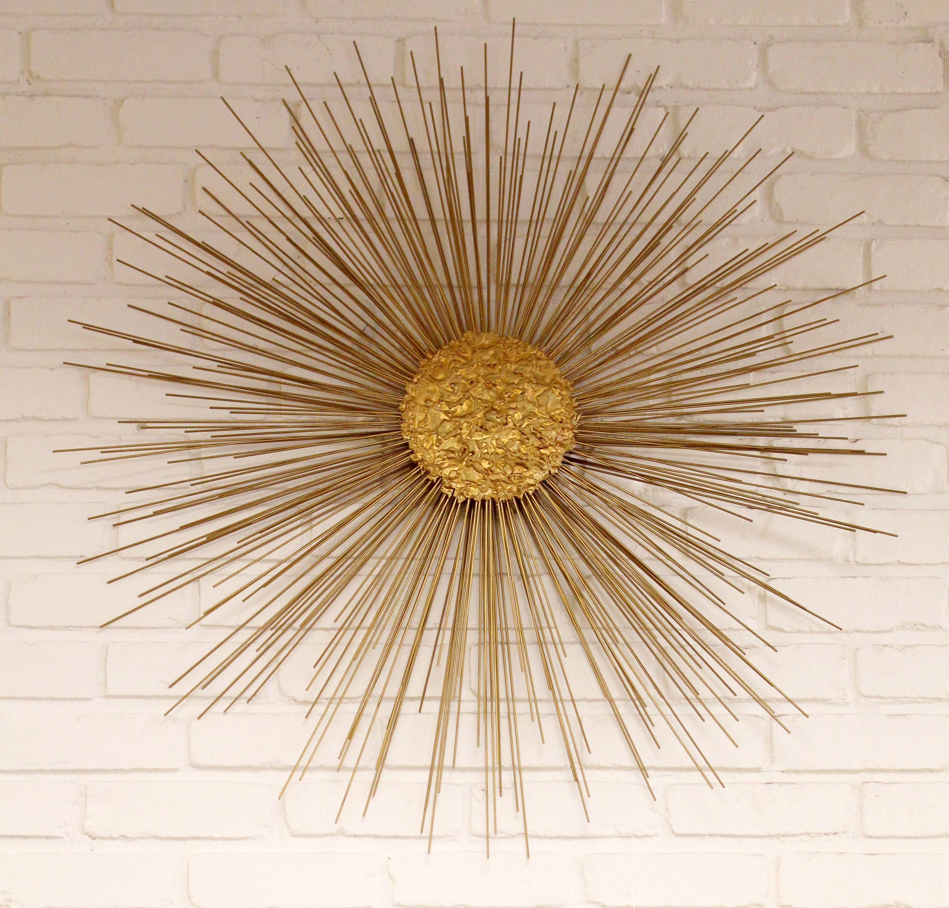 For your consideration is a beautiful, brass, sunburst starburst, hanging wall sculpture by Curtis Jere, circa 1980s. In excellent condition. The dimensions are 40