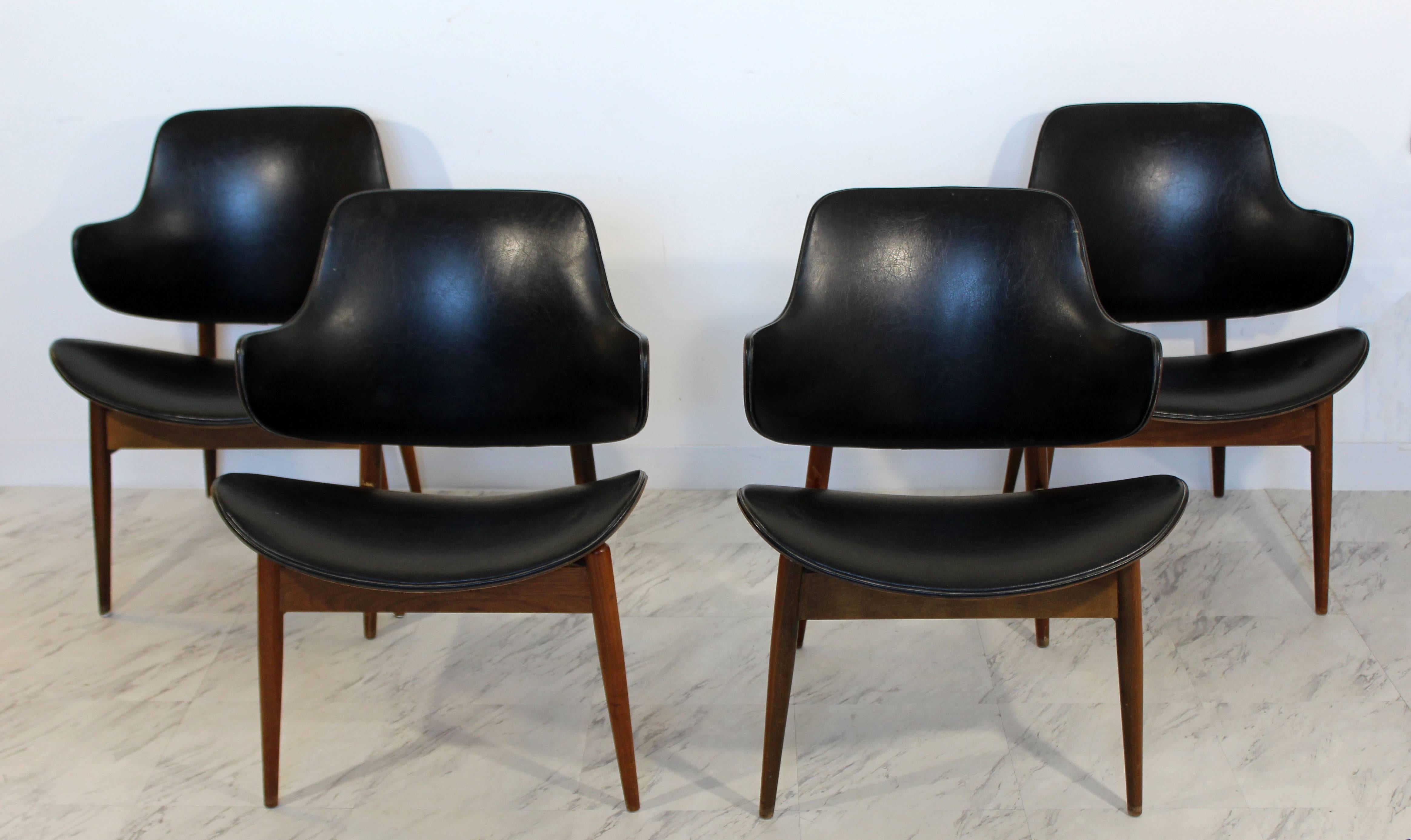 For your consideration is a fabulously sculptural, set of four dining or lounge chairs, by Seymour James Wiener for Kodawood, circa the 1960s. In excellent condition. The dimensions are 22.5