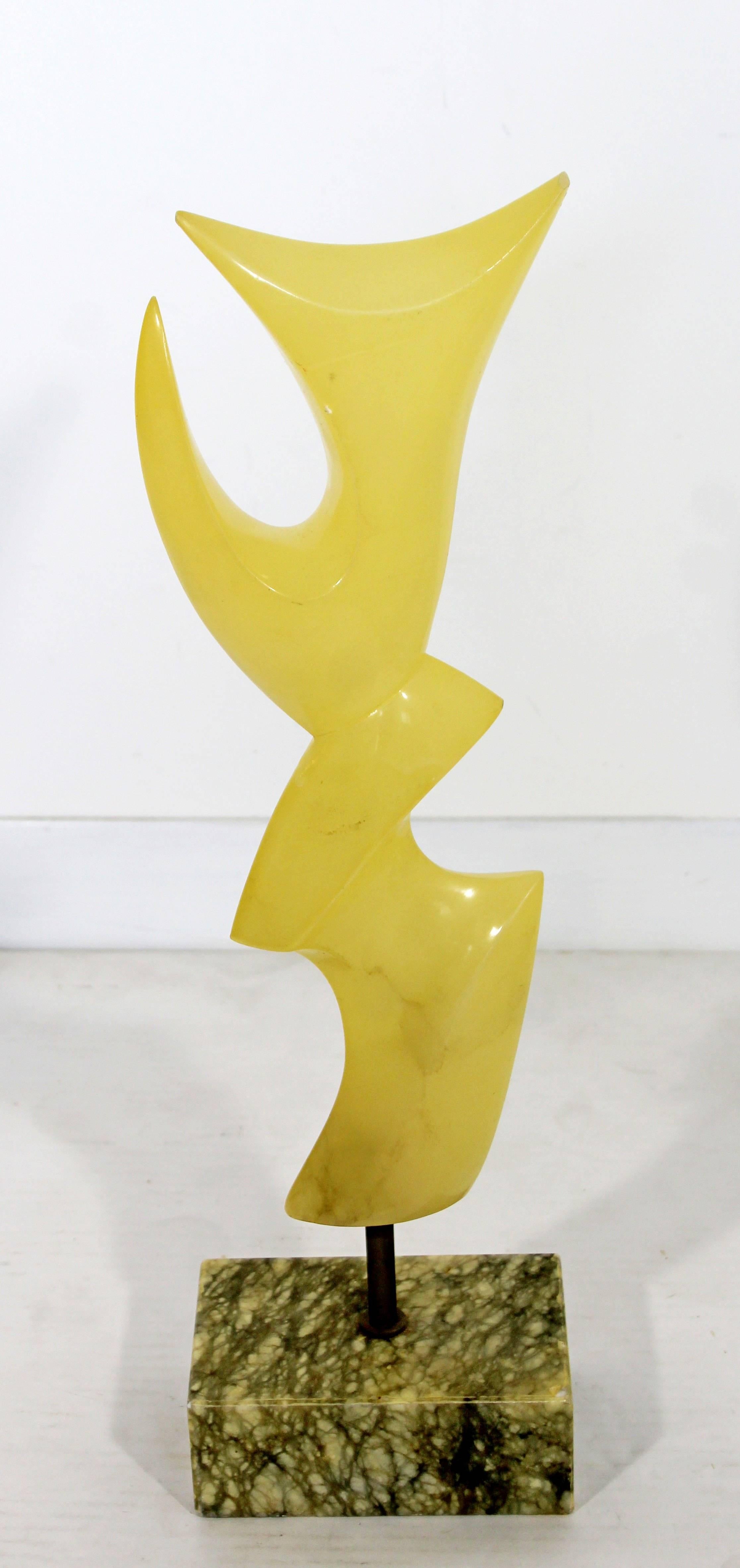 For your consideration is a beautiful, alabaster on green marble base, abstract, table sculpture from Italy. In excellent condition. The dimensions are 6.25