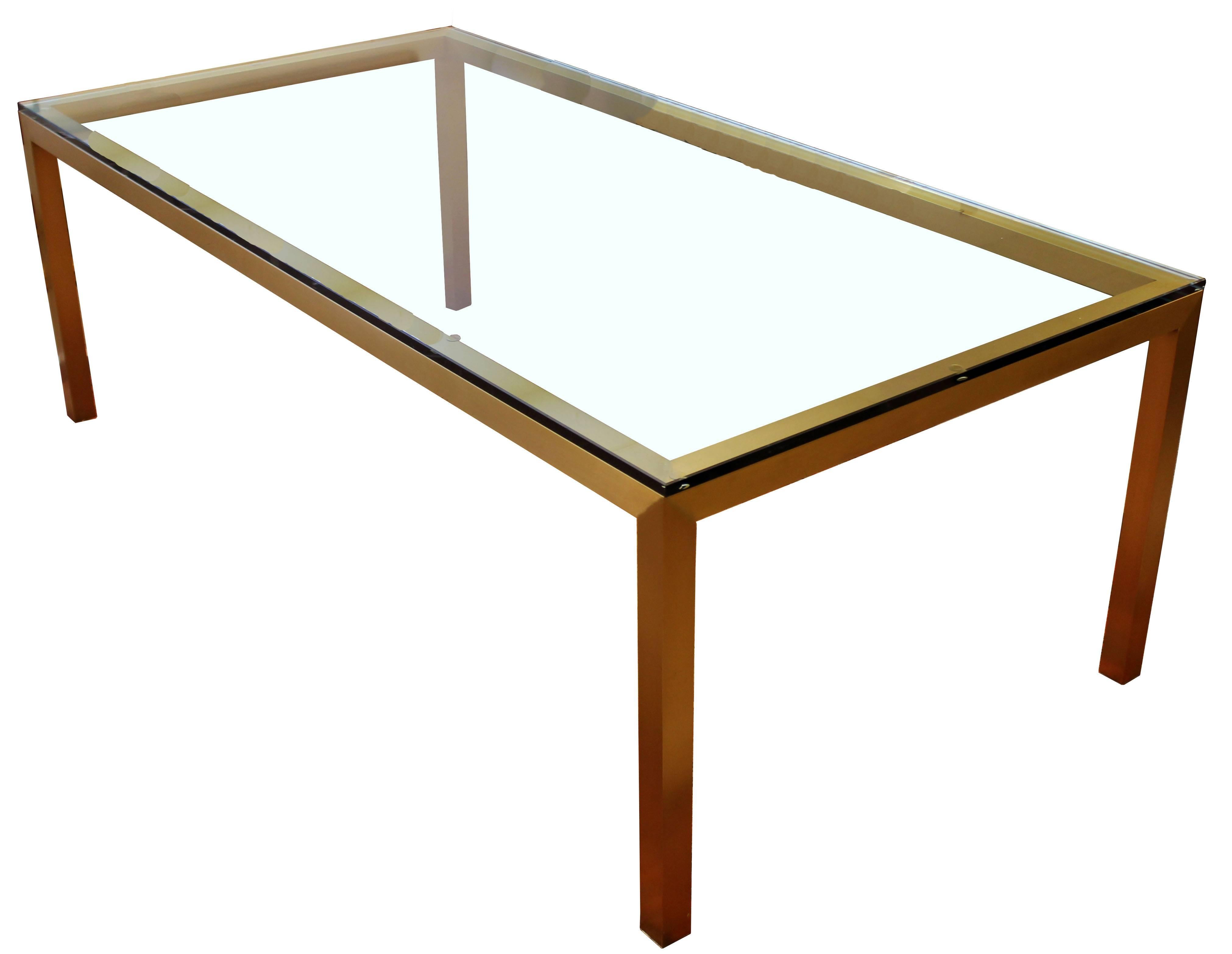 For your consideration long, luxe, bronze and glass, dining table by Brueton . In excellent condition. The dimensions are 84