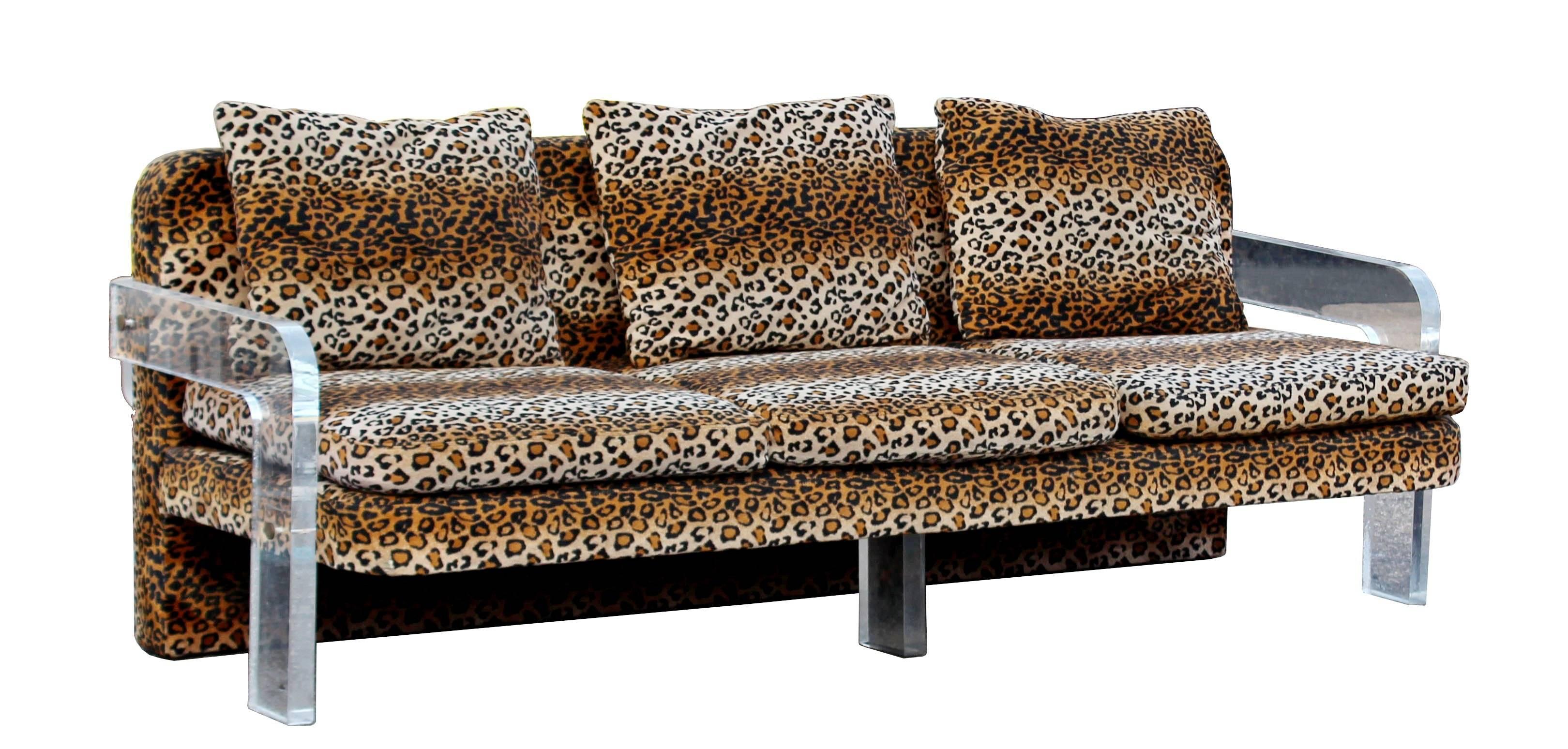 For your consideration is a fabulous and rare Vladimir Kagan sofa for Weiman & Warren Lloyd from the 1970s. Leopard print with curved Lucite. In very good condition. The dimensions are 84
