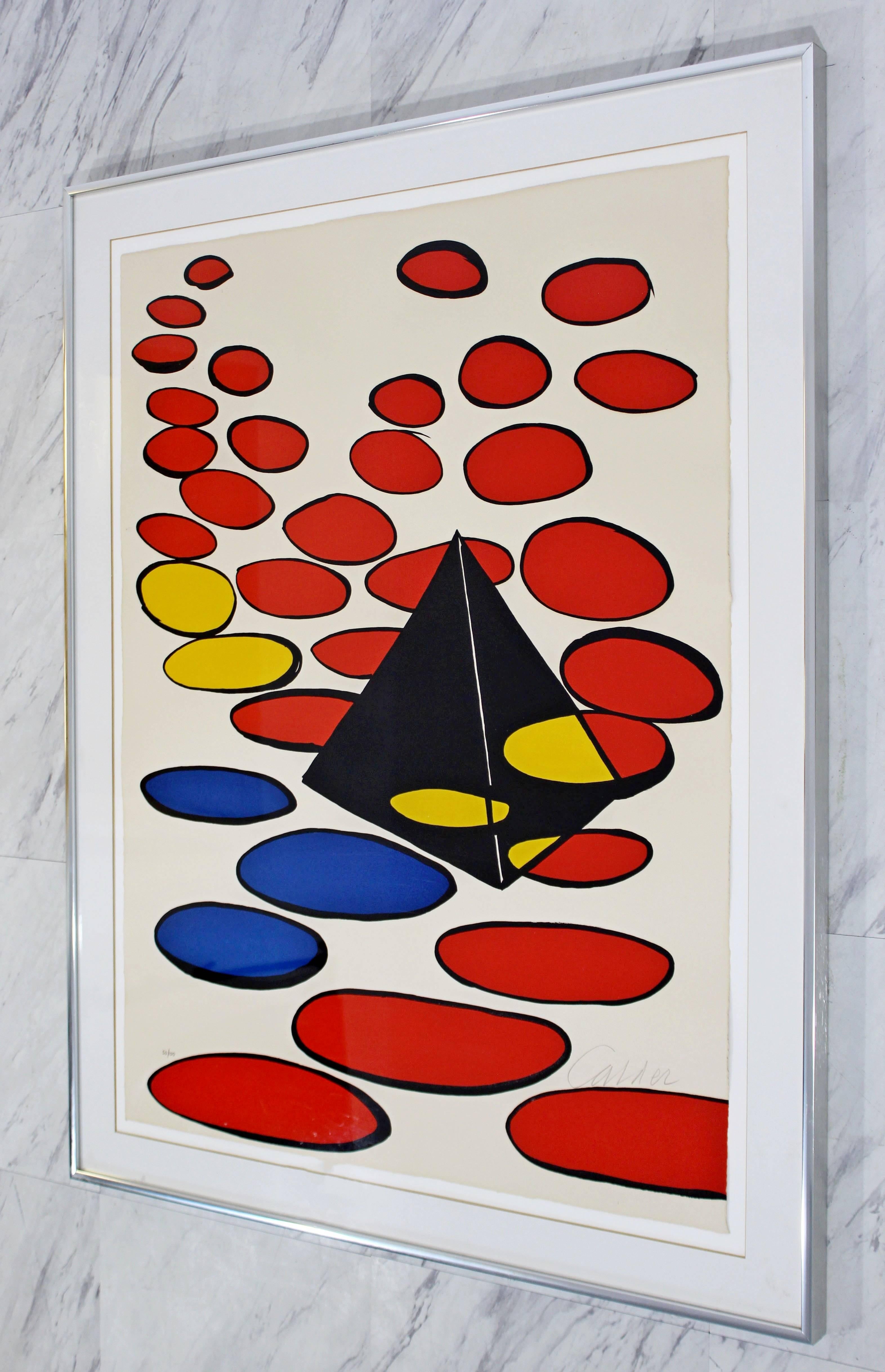 For your consideration is a fun, prime color, lithograph on cream woven paper, pencil signed and numbered by Alexander Calder, 50/100. In excellent condition. The dimensions of the frame are 28