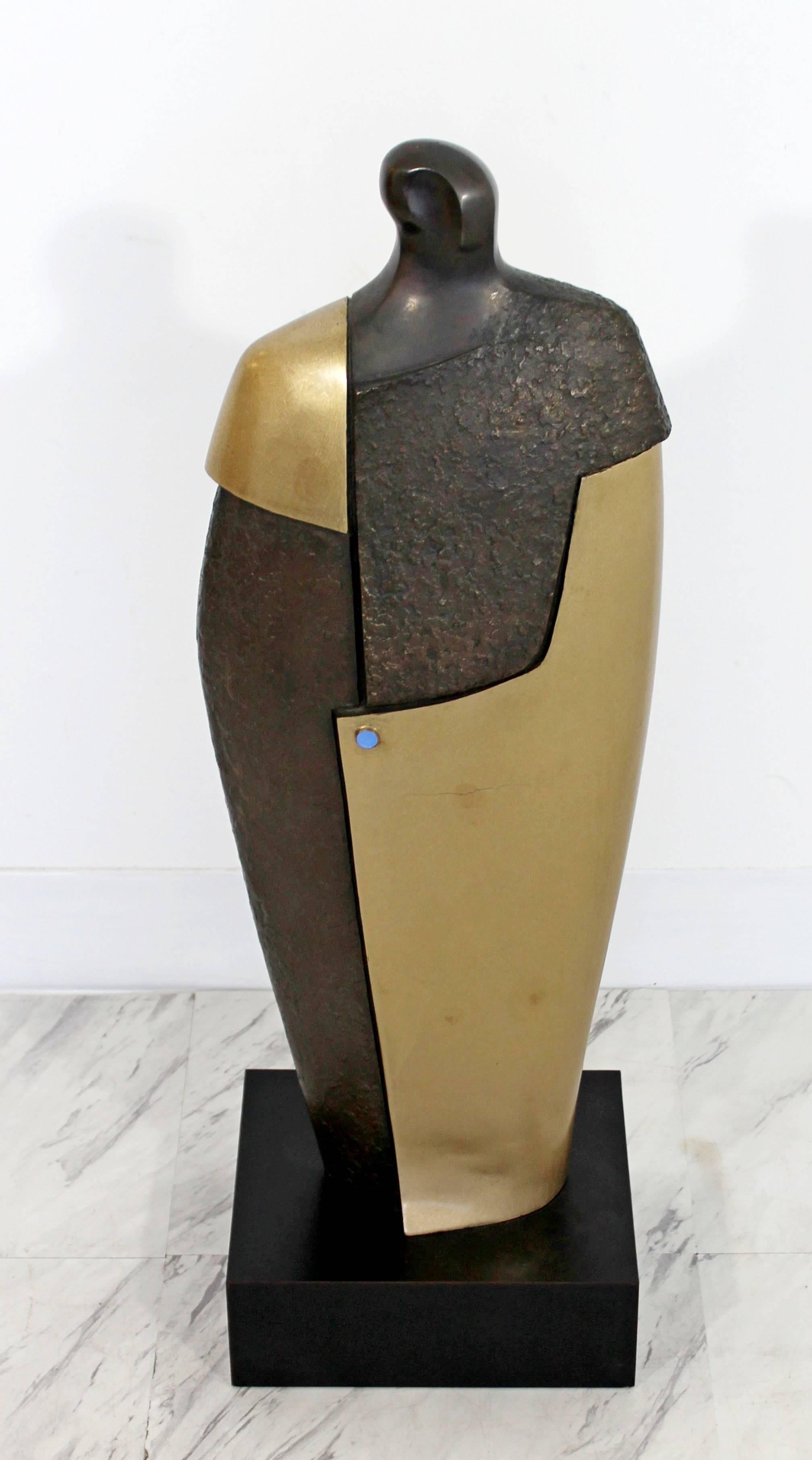 For your consideration is a fabulous bronze table sculpture of an abstracted figure, signed and numbered 2/6 by John Baldwin. In excellent condition. The dimensions are 8.5