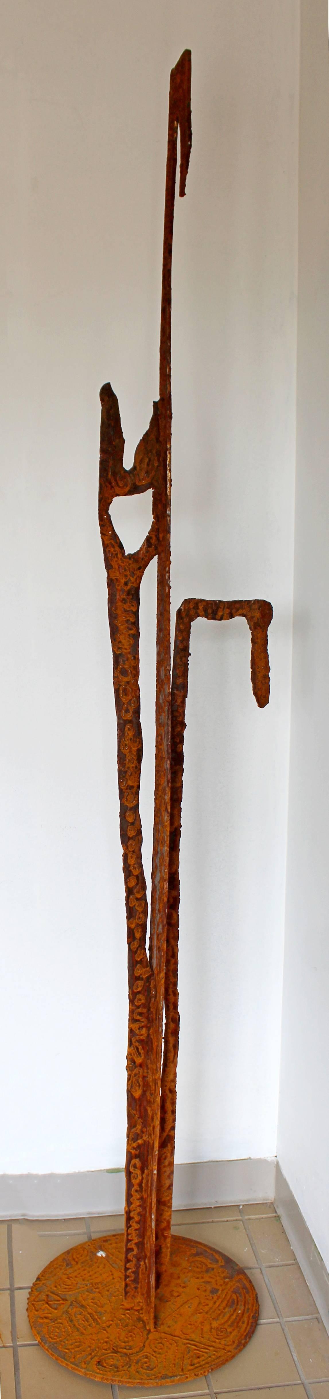 For your consideration is a wonderful, abstract, steel sculpture, with a beautiful patina, fabricated and signed by artist Erich Bolinger. In excellent condition. The dimensions are 16.5