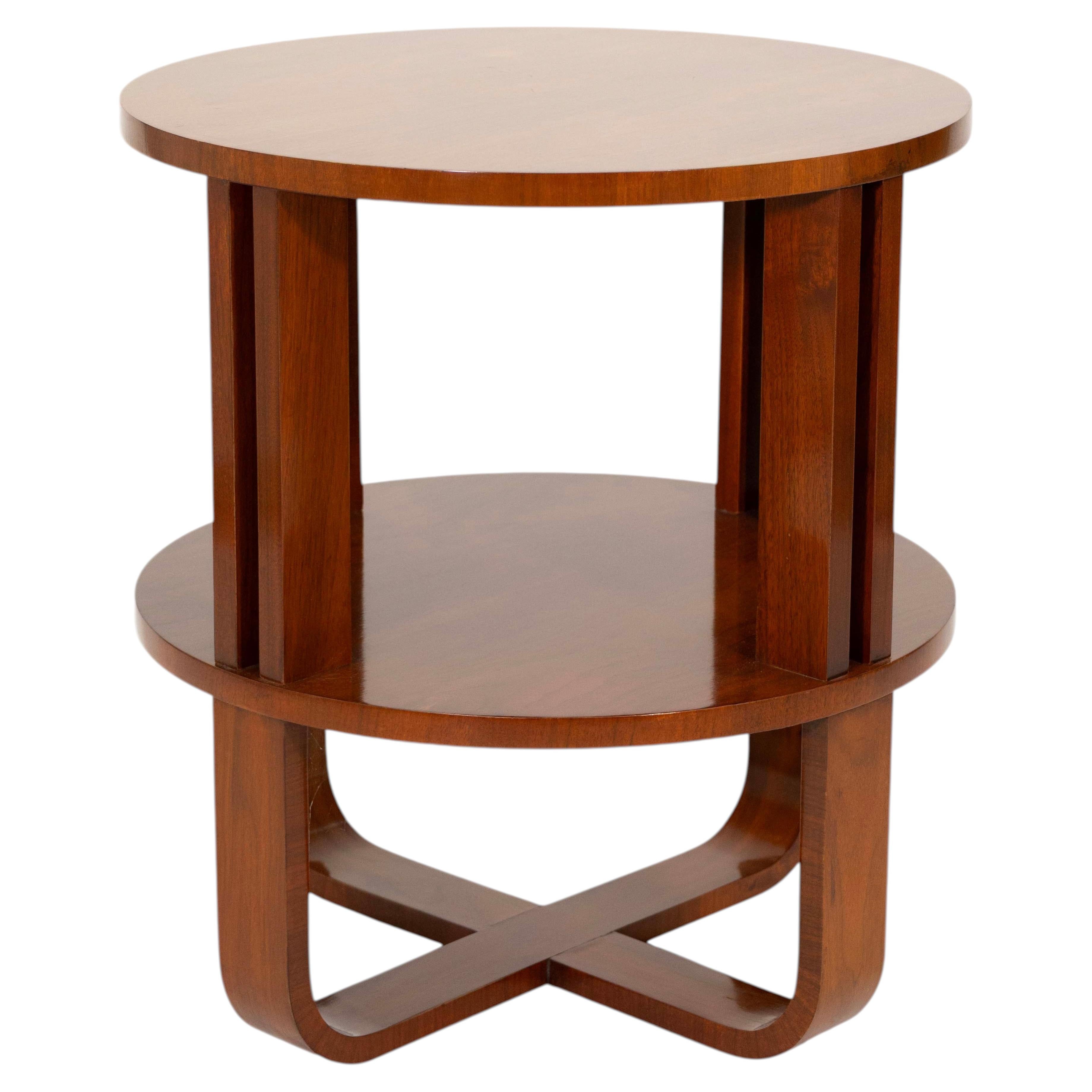 Elegant Ralph Lauren Home lamp table featuring a rich wood finish and a distinct For Sale