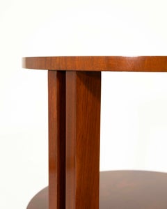 Elegant Ralph Lauren Home lamp table featuring a rich wood finish and a distinct