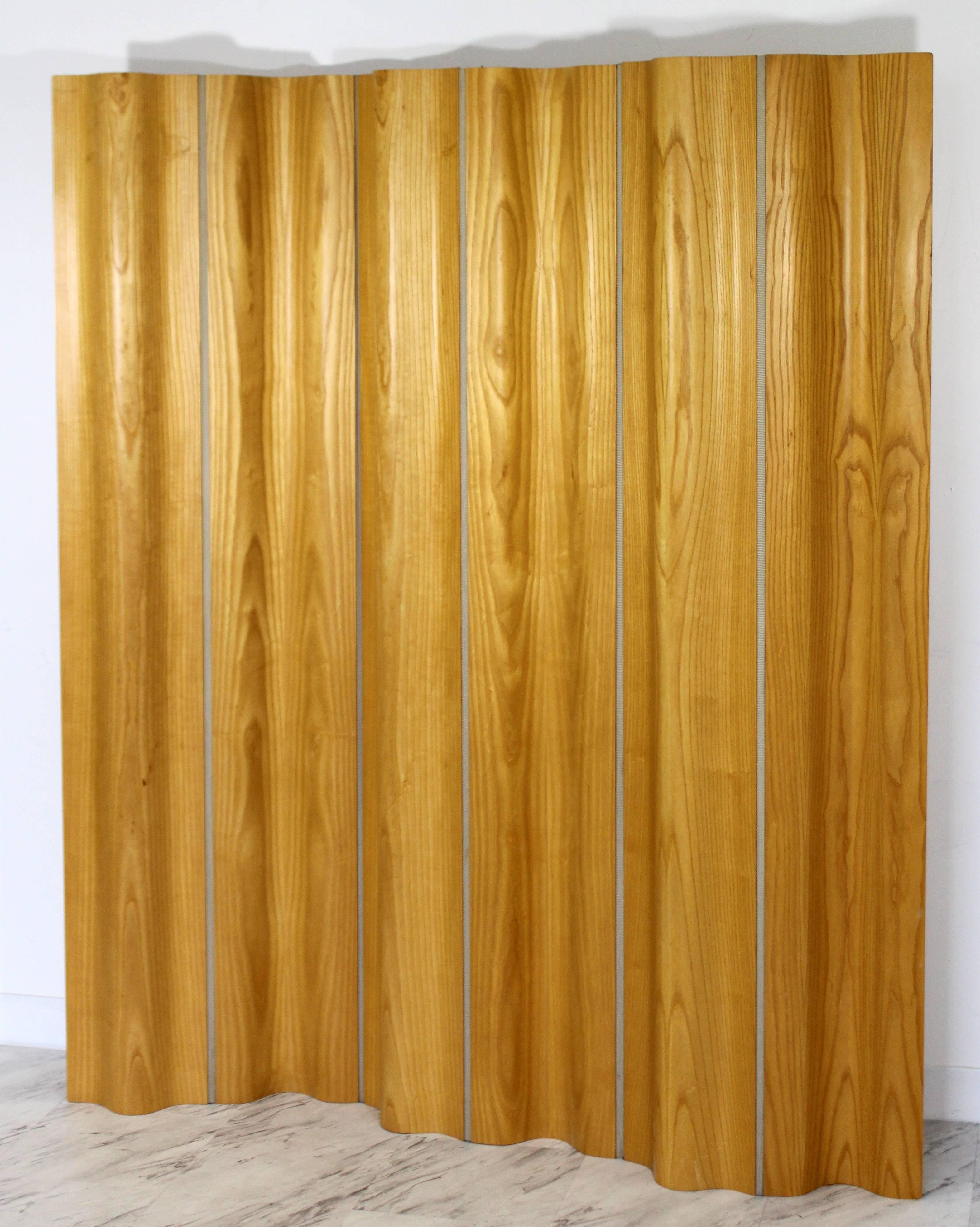 For your consideration is a fantastic, folding screen, room divider, made of ashwood. In excellent condition. By Herman Miller for DWR. The dimensions of each panel are 9.5