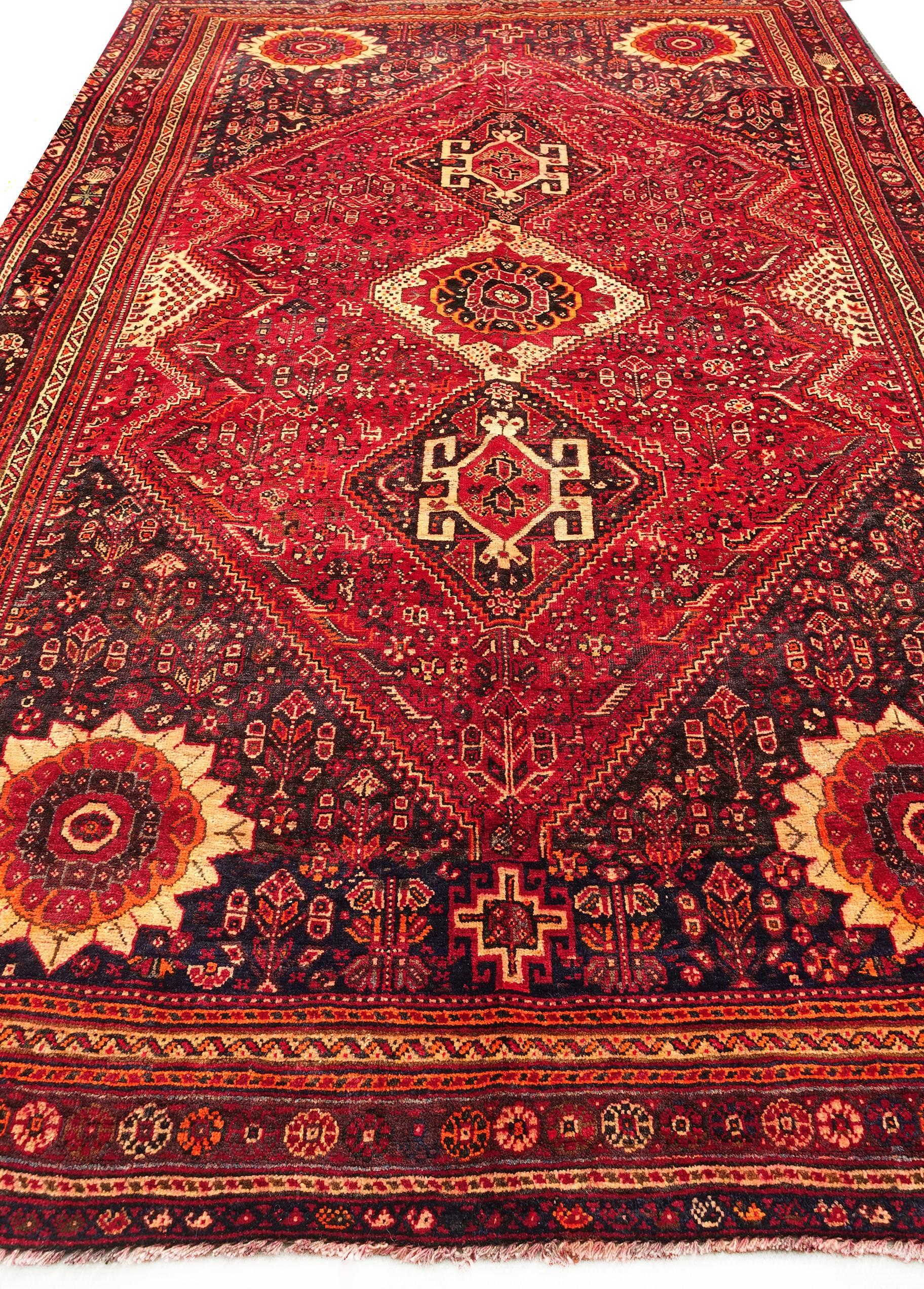 Beautiful authentic large semi-antique Persian Shiraz carpet 300 x 200cm from 1970s or earlier

Material: Wool on wool
Manufacturing period: 1950-1970
Country: Iran
Condition: Excellent
This large carpet dates to the late 1950s or early 1970s