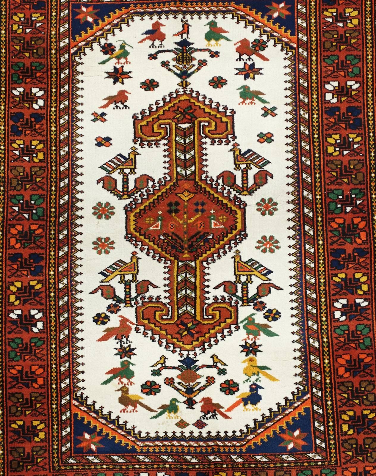 Vintage Persian Nomadic Afshar rug, circa 1990

Material: Wool on wool
Manufacturing period: 1950-1999
Country: Iran
Condition: Excellent 

This is an authentic and beautiful thick and heavy Afshari tent rug. It is hand-knotted with 100%