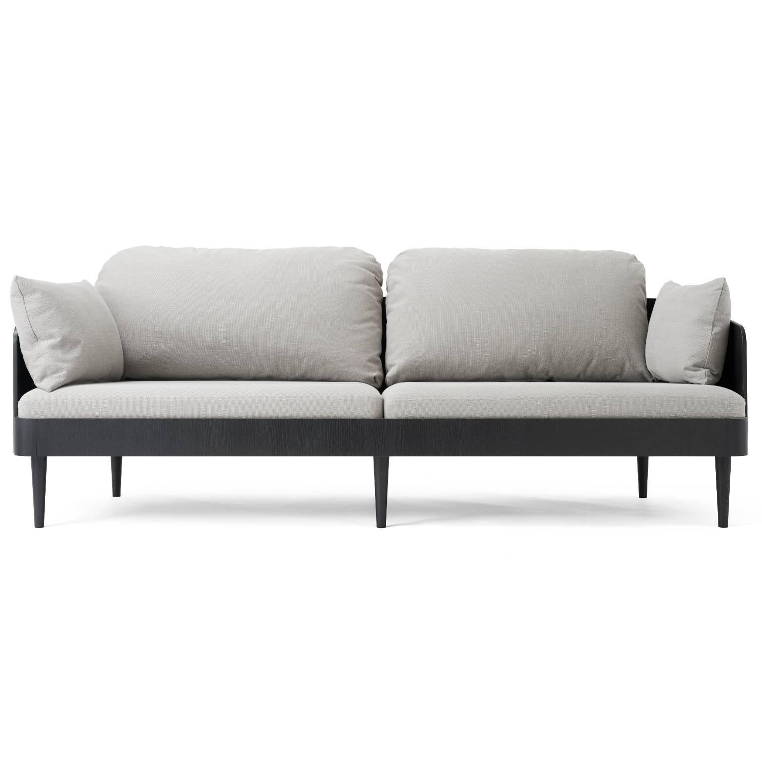 The Septembre series solves an age-old conundrum of sofa design: while fully-upholstered sofas are comfortable, they often look boxy and inelegant. More structured sofas are aesthetically pleasing yet are seldom made for relaxation. The Septembre