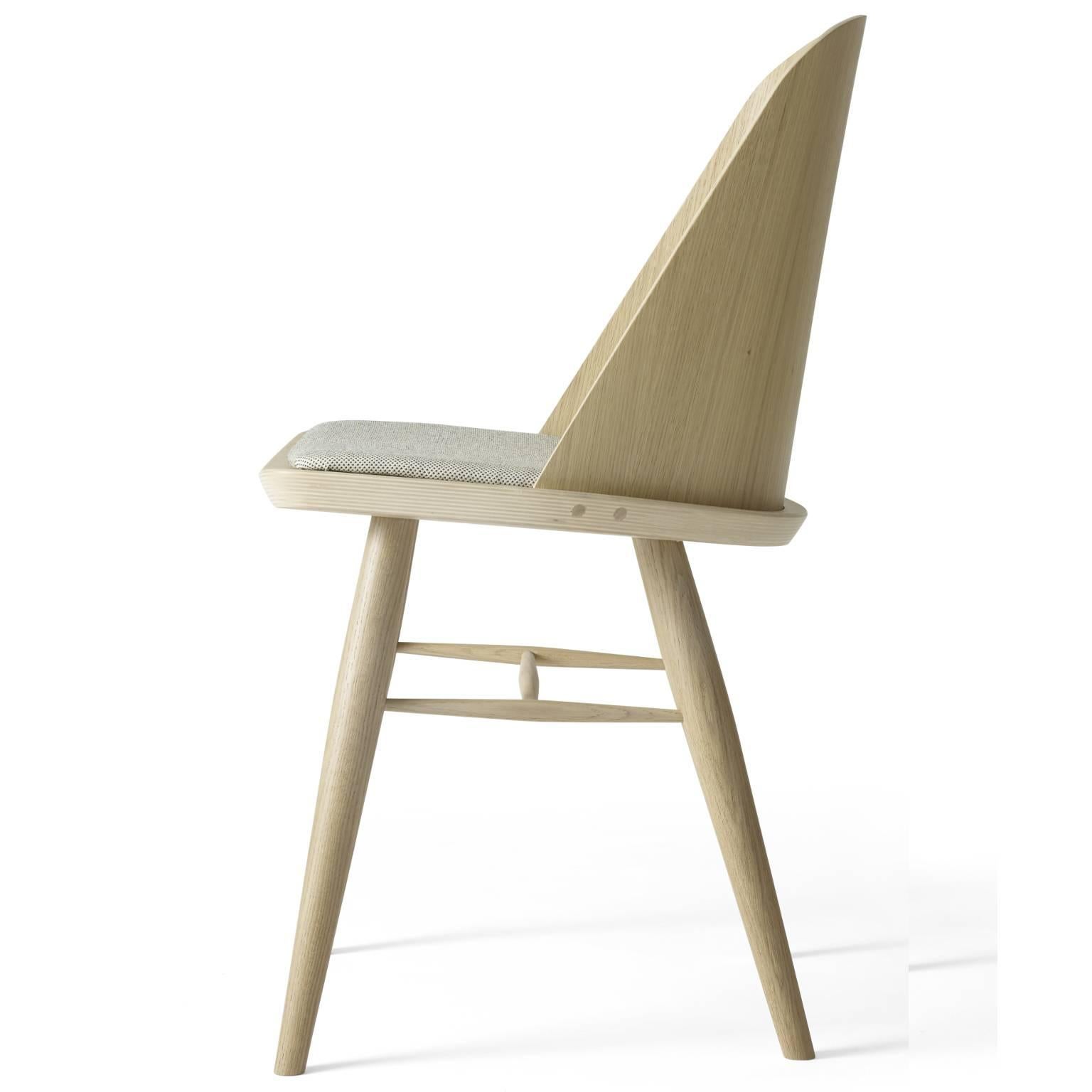Less is more with Synnes chair, a distinctively modern take on the Classic Scandinavian dining chair from one of the region's most exciting young designers, Falke Svatun. The chair came to life when the Norwegian had the idea of inserting a sheet of