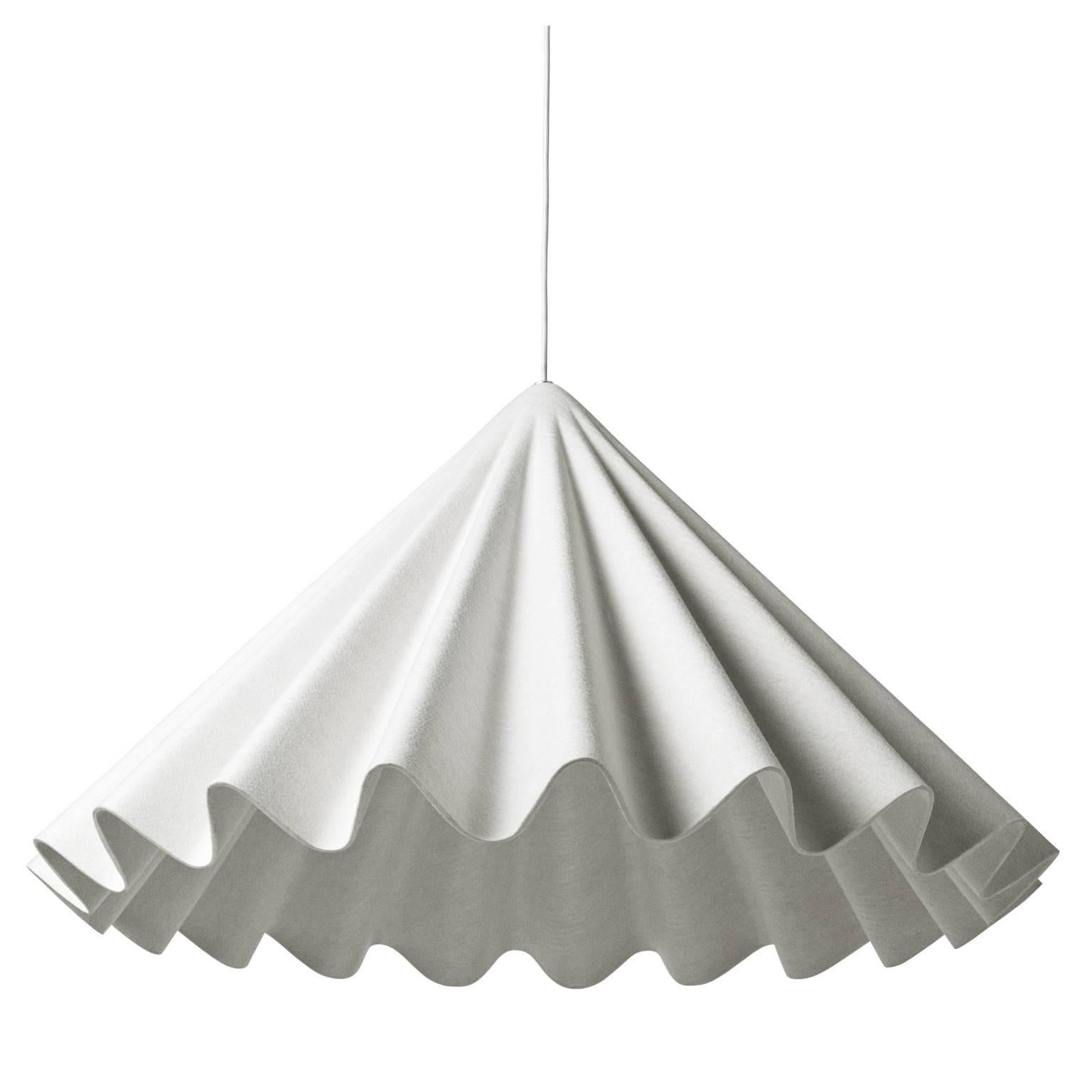 Like a skirt in the wind, an idea that grows and finds its final form - correct and controlled. The Dancing Pendant Lamp is made of polyester felt. The lamp suggests an elegant dancer on the dance floor, mid-twirl.
  