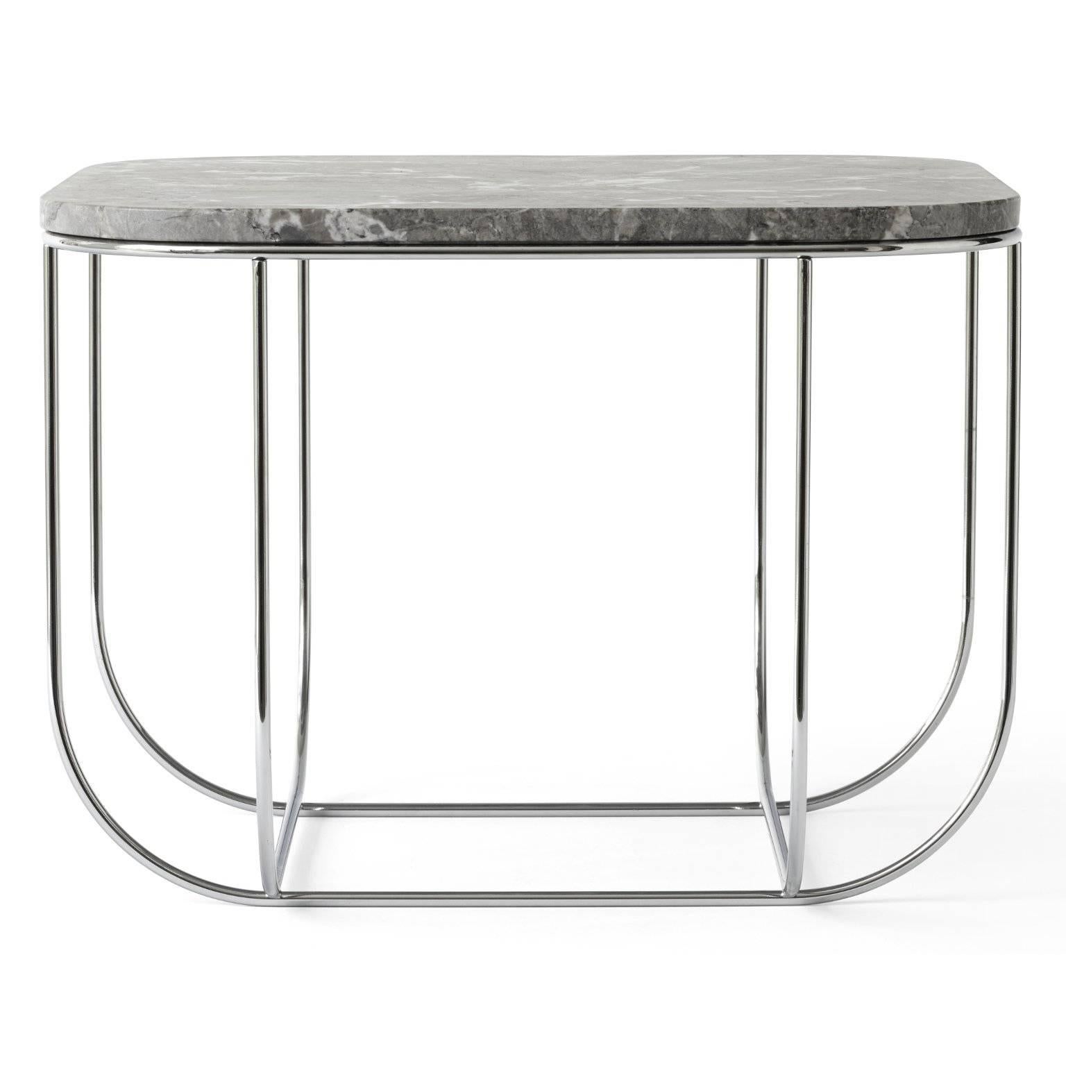 New ways of living demand new design solutions. That’s the philosophy behind the cage series, which combines strong functional storage ambition with an elegant aesthetic. Cage table is a beautiful marble top side table with slender steel legs that