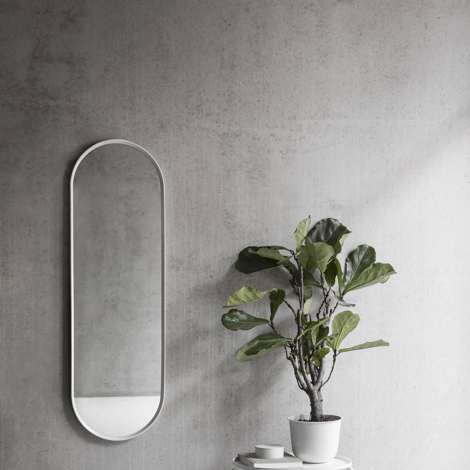 Inspired by vintage dressing room mirrors, oval mirror is simple and streamlined. A practical and versatile mirror, use it in the bathroom, hallway or dressing-room. Oval mirror is part of a series by Norm Architects, each mirror made with a