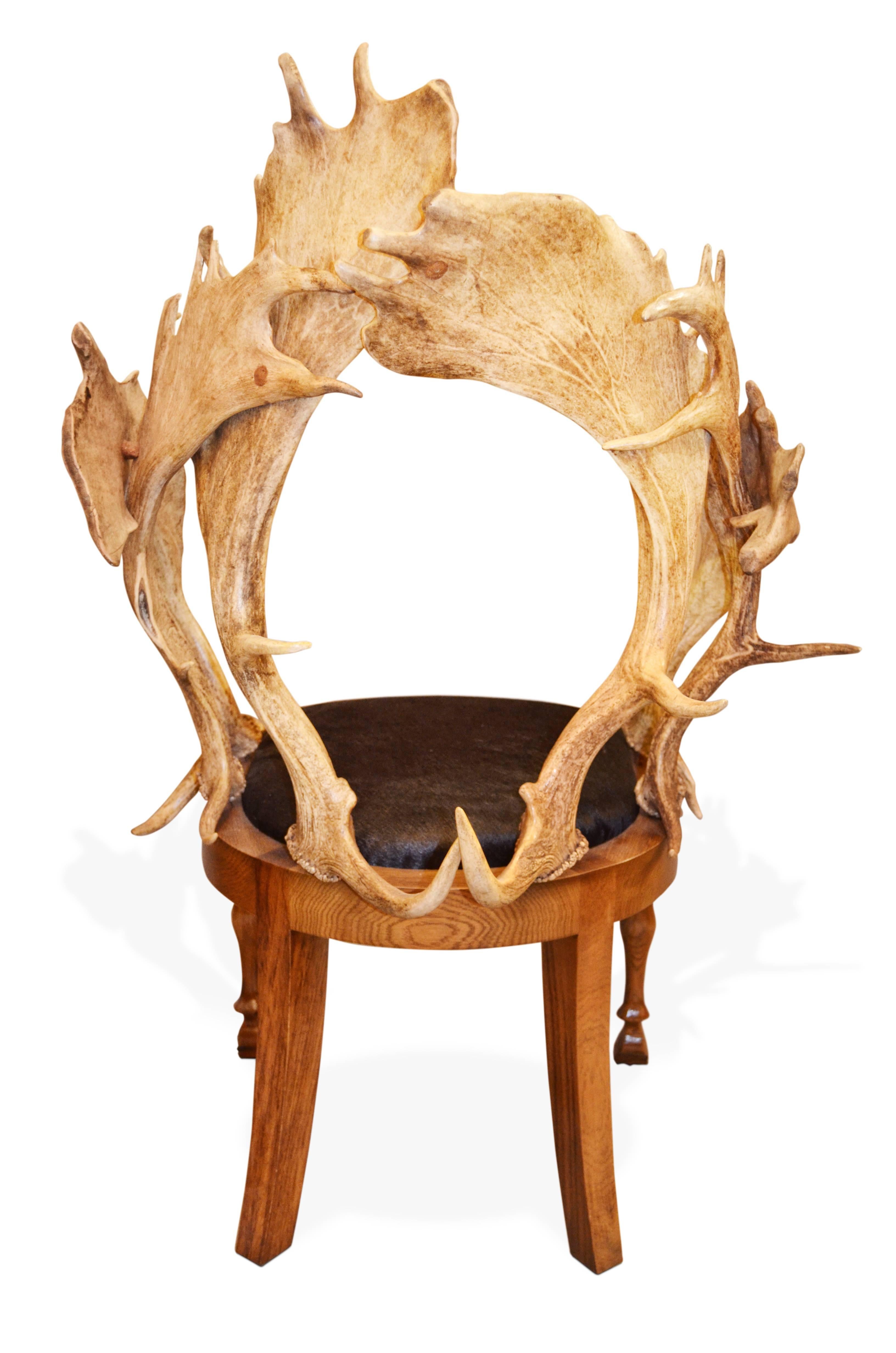 English Anthony Redmile Continental Fallow Deer Antler Chairs with Cow Hide Seat For Sale