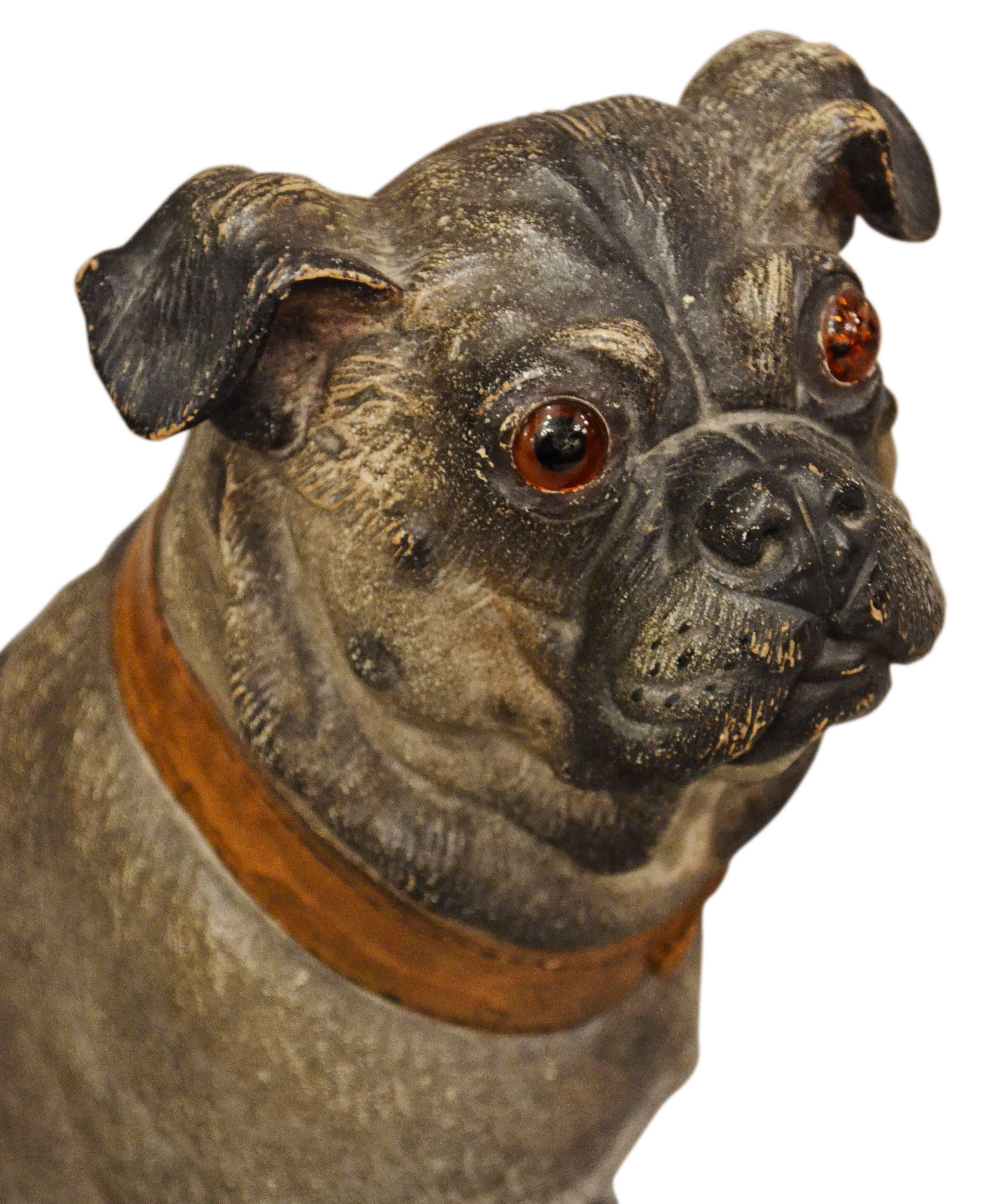 An Austrian cold painted terracotta figure of a Pug, late 19th century, circa 1900.