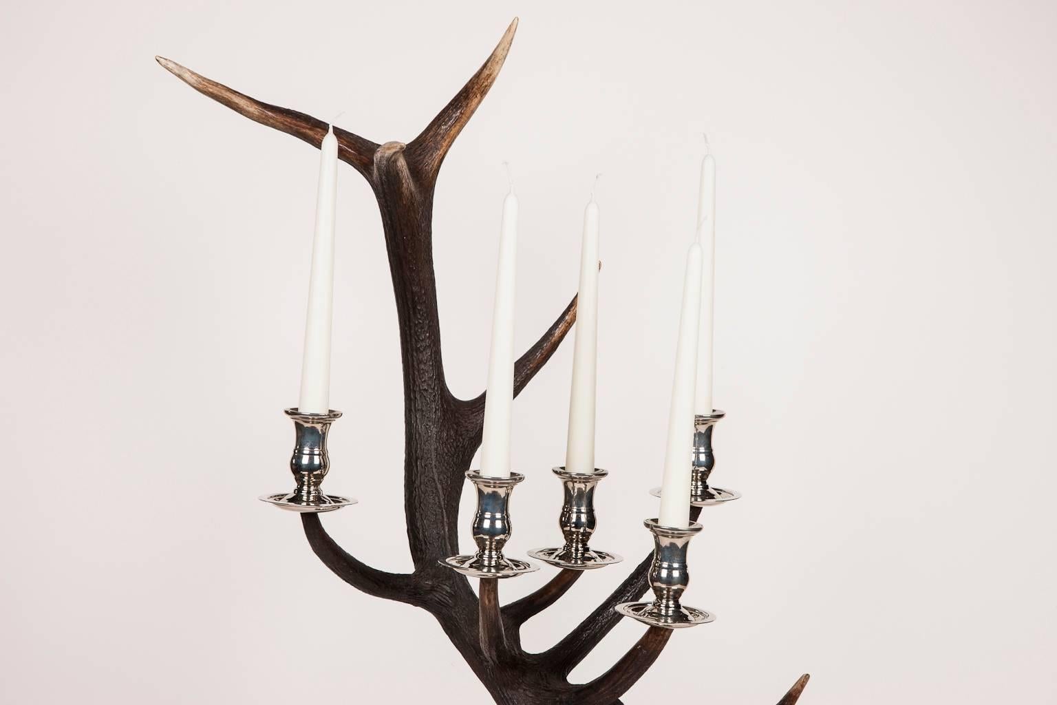 Anthony Redmile Scottish stag red deer antler candlesticks available in a number of finishes and styles.

 