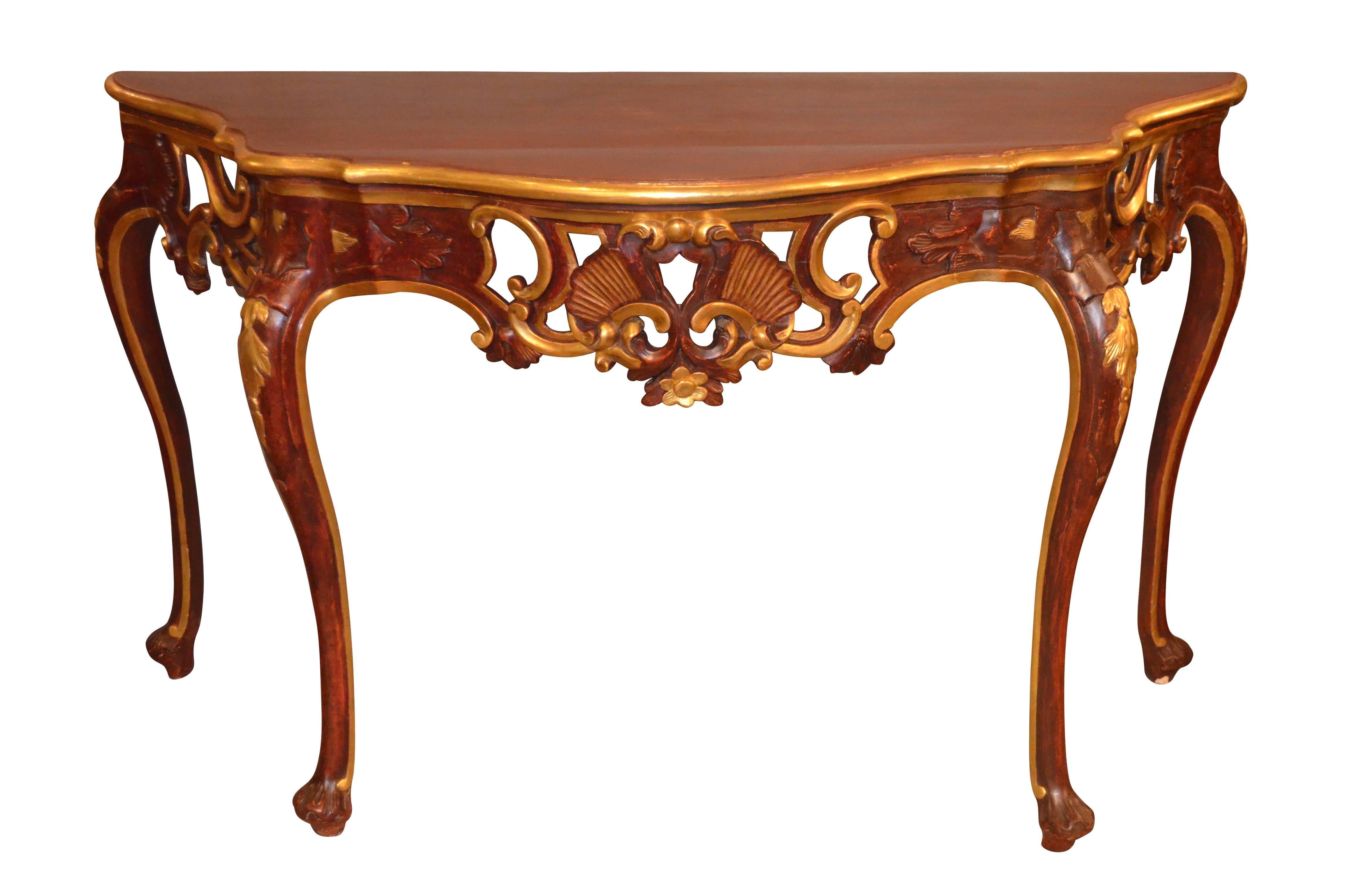19th pair of painted and giltwood Italian console tables with serpentine front, of superb quality and size with beautiful detailed carving.