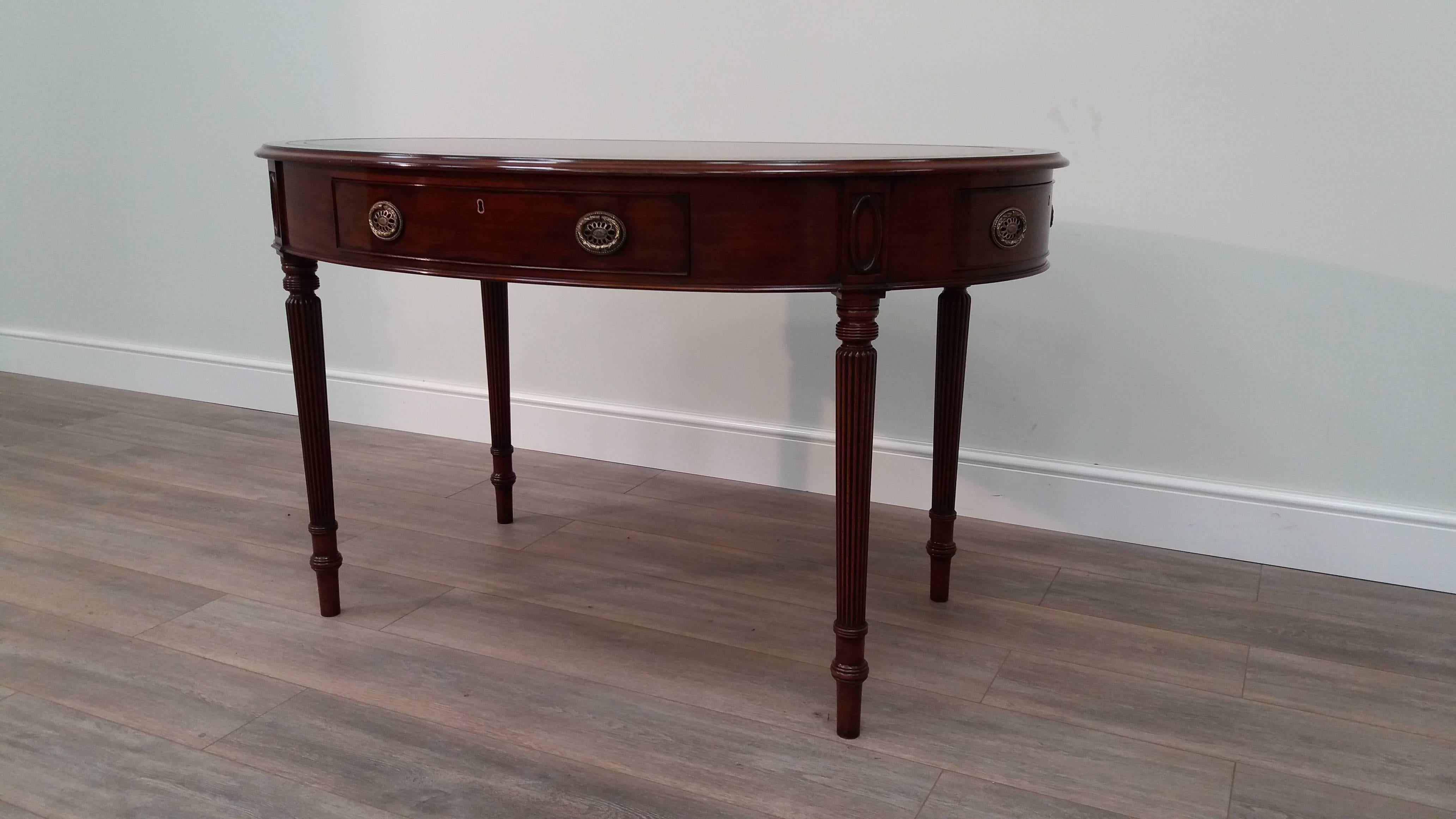 British Arthur Brett Regency-style Mahogany Oval Writing Table with Leather Top For Sale