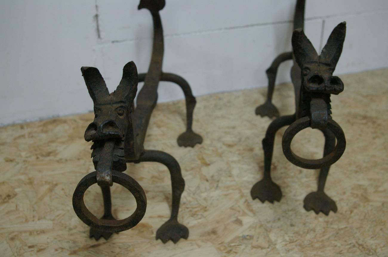 Set of two beautiful French wrought iron Dragon andirons or chenets in the style of Samuel Yellin and made in the early 1900s.

They are in a good but used.

The sizes are:
55 cm/21.6 inch long
5 cm/1.9 wide
30 cm/11.8 high.