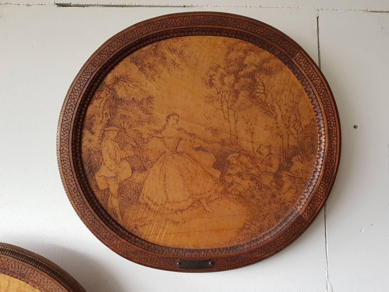 Two French pyro engravings in the style of Lancret made circa 1880, both have a romantic scene after paintings by Lancret. These are very nice handcrafted with a hot needle to burn the wood and make shadows to get a image.
Both are titled on a