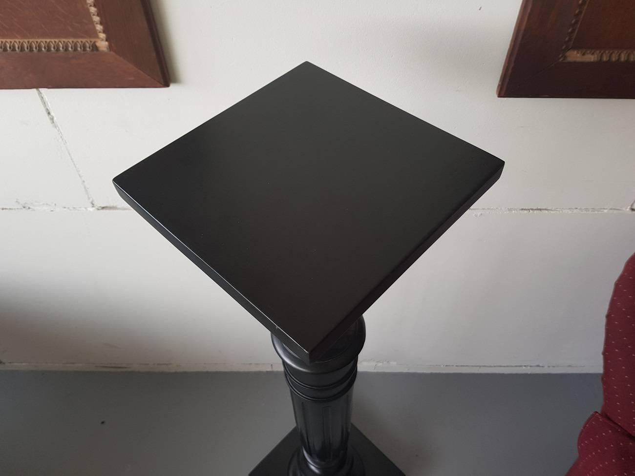 Late 19th century Dutch black polished pedestal or column made of mahogany and is fully restored.

The measurements are,
Depth 25,5 cm/ 10 inch.
Width 25,5 cm/ 10 inch.
Height 108 cm/ 42.5 inch.