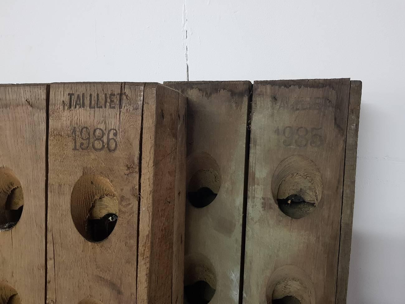 Two original French oak Champagne racks made by the French Company Tailliet both dated with 1985 and 1986, the can hold up 120 bottles of champagne and these are not used a lot.

The measurements are,
Depth 140 cm max/ 55.1 inch max. They can