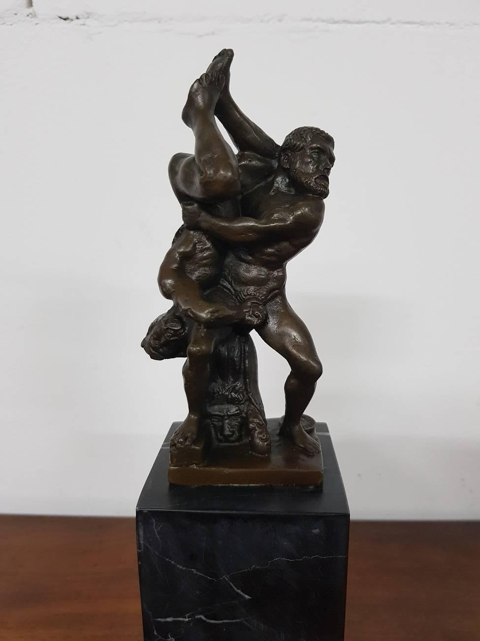 French bronze sculpture on black marble base depicting Hercules and Diomedes after the marble statue of Vincenzo de Rossi, circa 1560. This one is from the second half of the 20th century and marked 