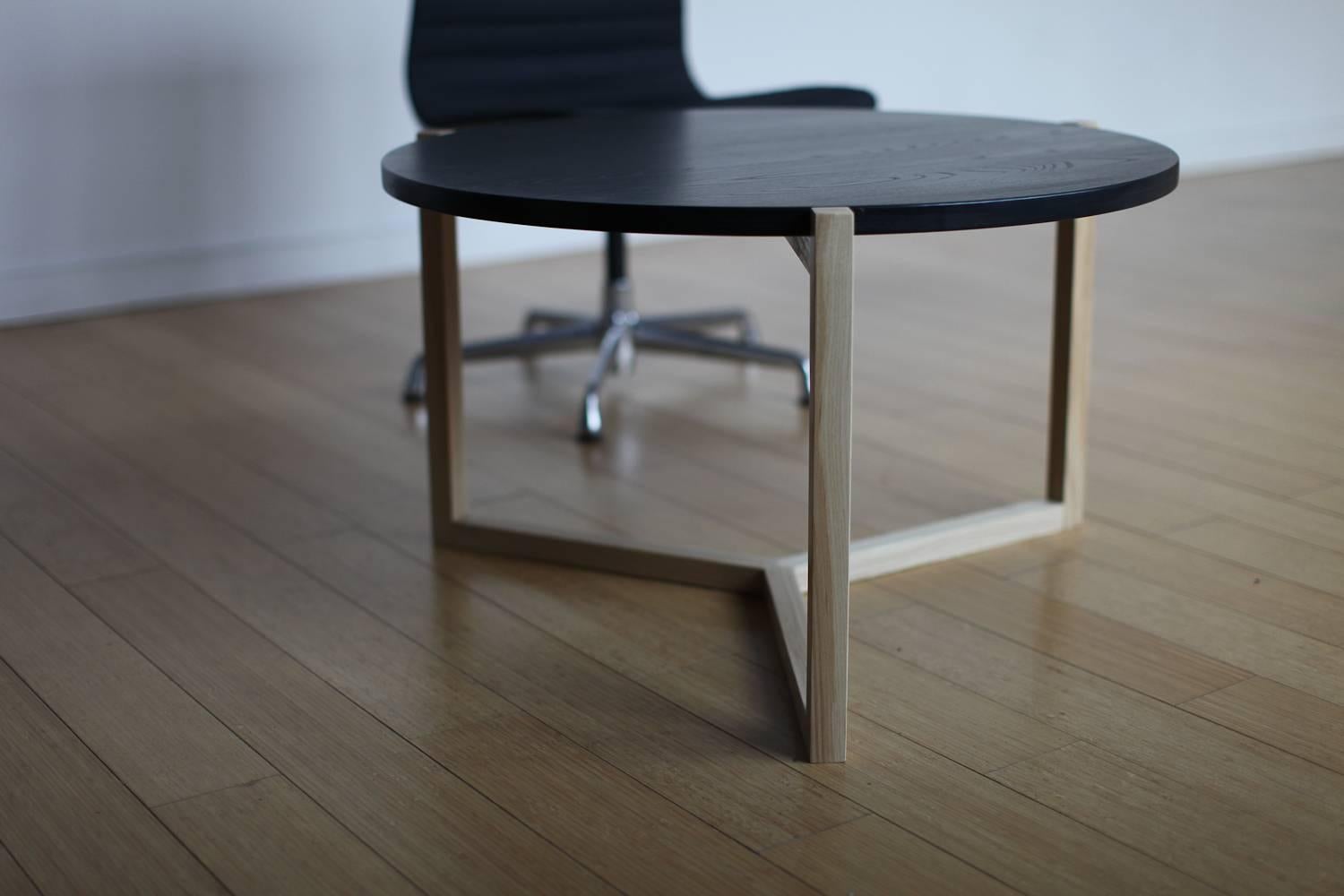 The Felix coffee table is built in our Brooklyn studio using premium hardwoods. The three legged design showcases a unique Silhouette from any angle, and the three way miter joint provides a functional detail at the base.

Made of solid wood, hand