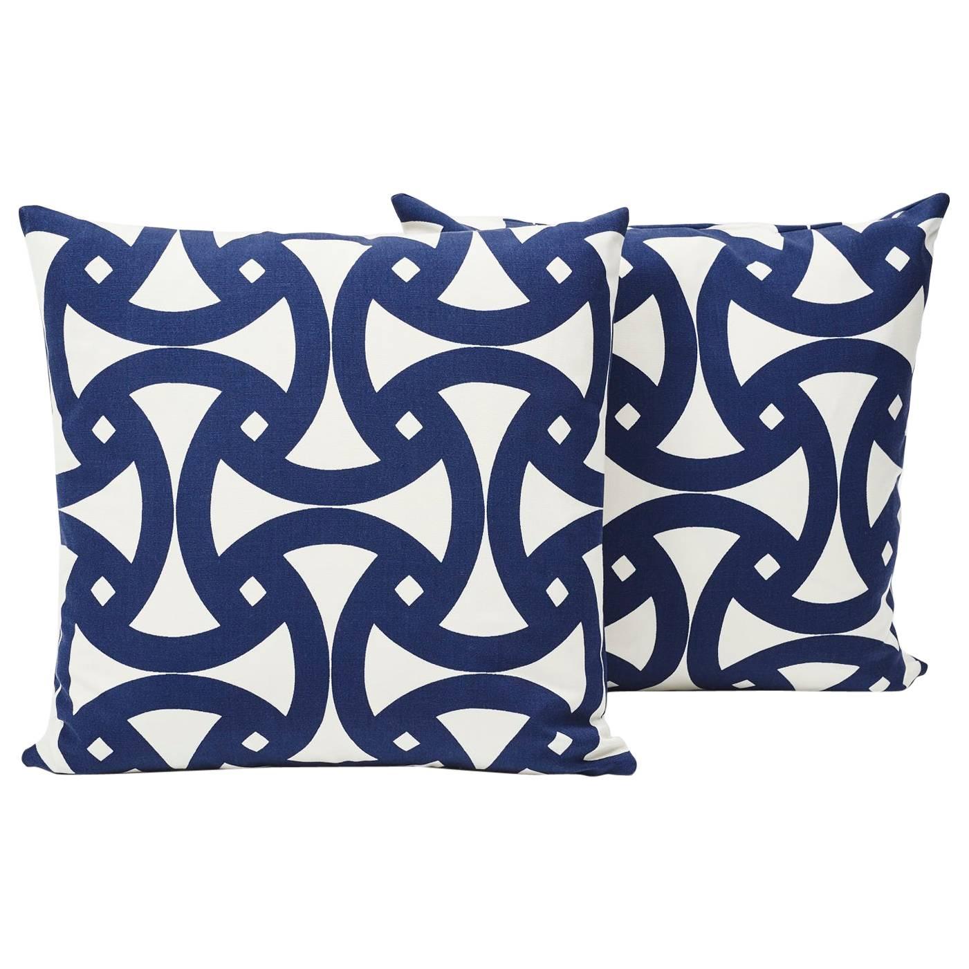 This marine blue geometric print, filled with interlocking curves, has a bold flair sure to heighten any setting! Made from 100% acrylic duck, this Schumacher Santorini print pillow is great for both indoor and outdoor use.   

*If out of stock,