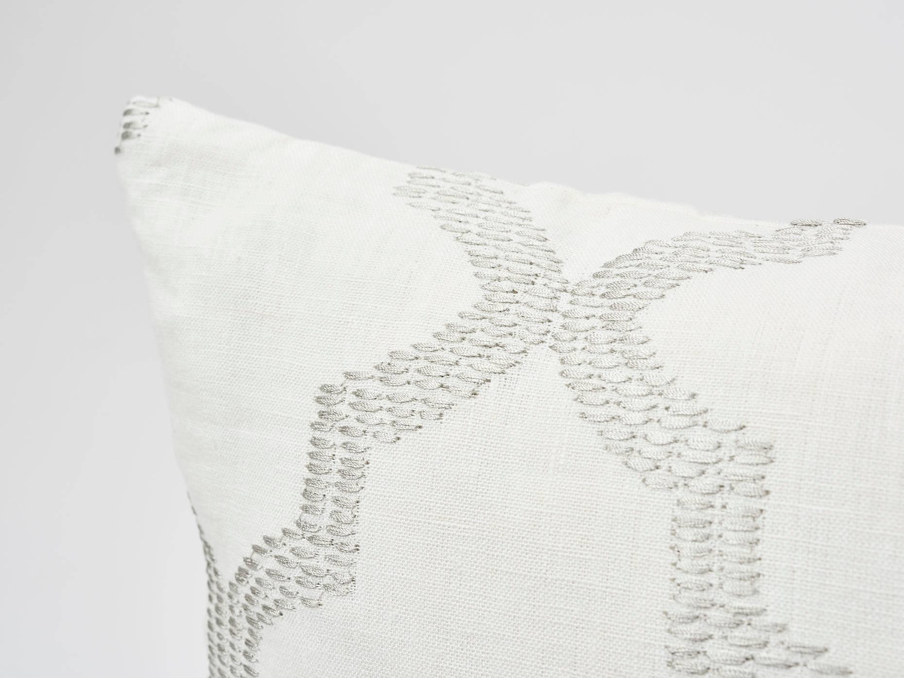Modern meets Moroccan in this stunning geometric Schumacher pattern. Tangier Embroidery is a fretwork motif embroidered in thick rayon yarn adding dimension and sheen. Subtle variations are part of its inherent natural beauty. Featured as a