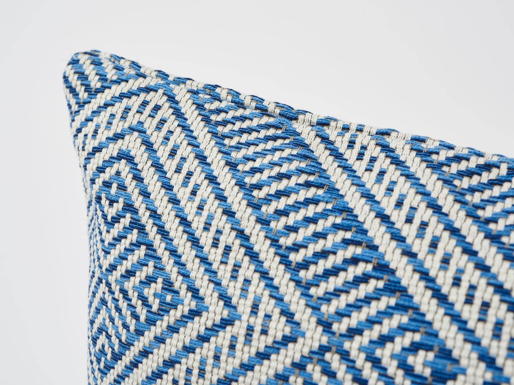 Inspired by basket designs, this concentric diamond pattern is woven from Dralon acrylic yarns. Textured and extremely durable, it is suitable for both indoor or outdoor decor settings. Finished in France and originally part of our C√¥te d'Azur