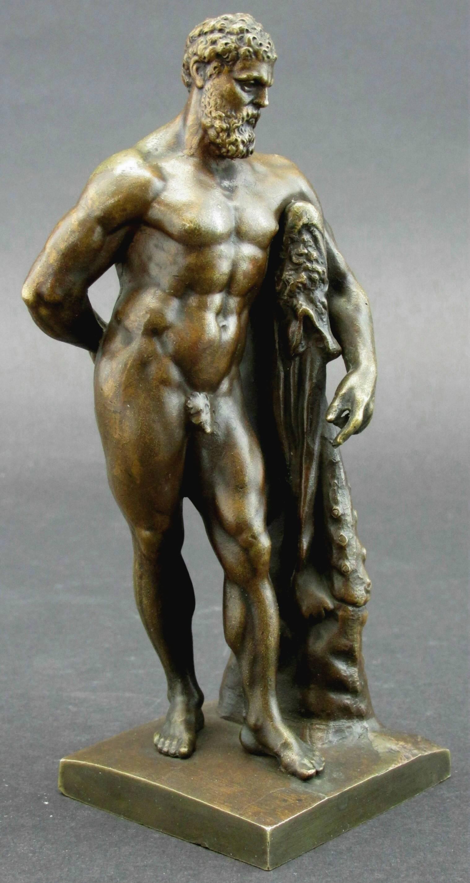 A finely executed full length bronze of the Farnese Hercules shown resting upon the skin of the Nemean Lion draped over his club, behind him he clutches the Apples of Hesperides in his right hand. Cast in two sections and exhibiting a Fine mellow
