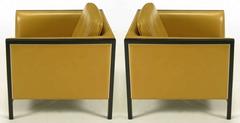 Pair of Stow Davis Leather, Ebonized Wood and Aluminium Even Armchairs