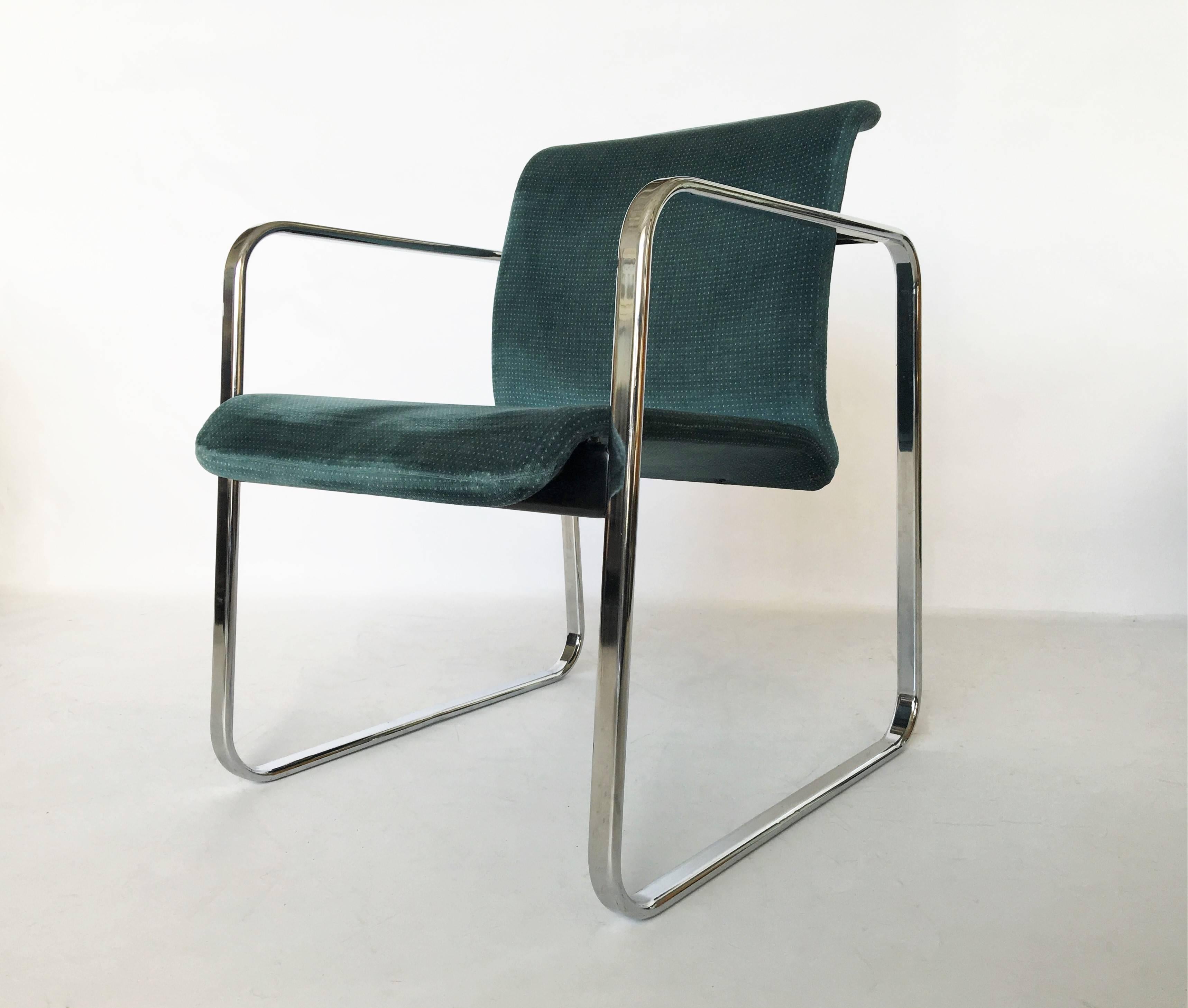 A set of eight dining chairs designed by Peter Protzman and Alexander Girard for Herman Miller, circa 1960s. The chairs feature a curved backrest, their original upholstery, tubular chrome legs and armrests.