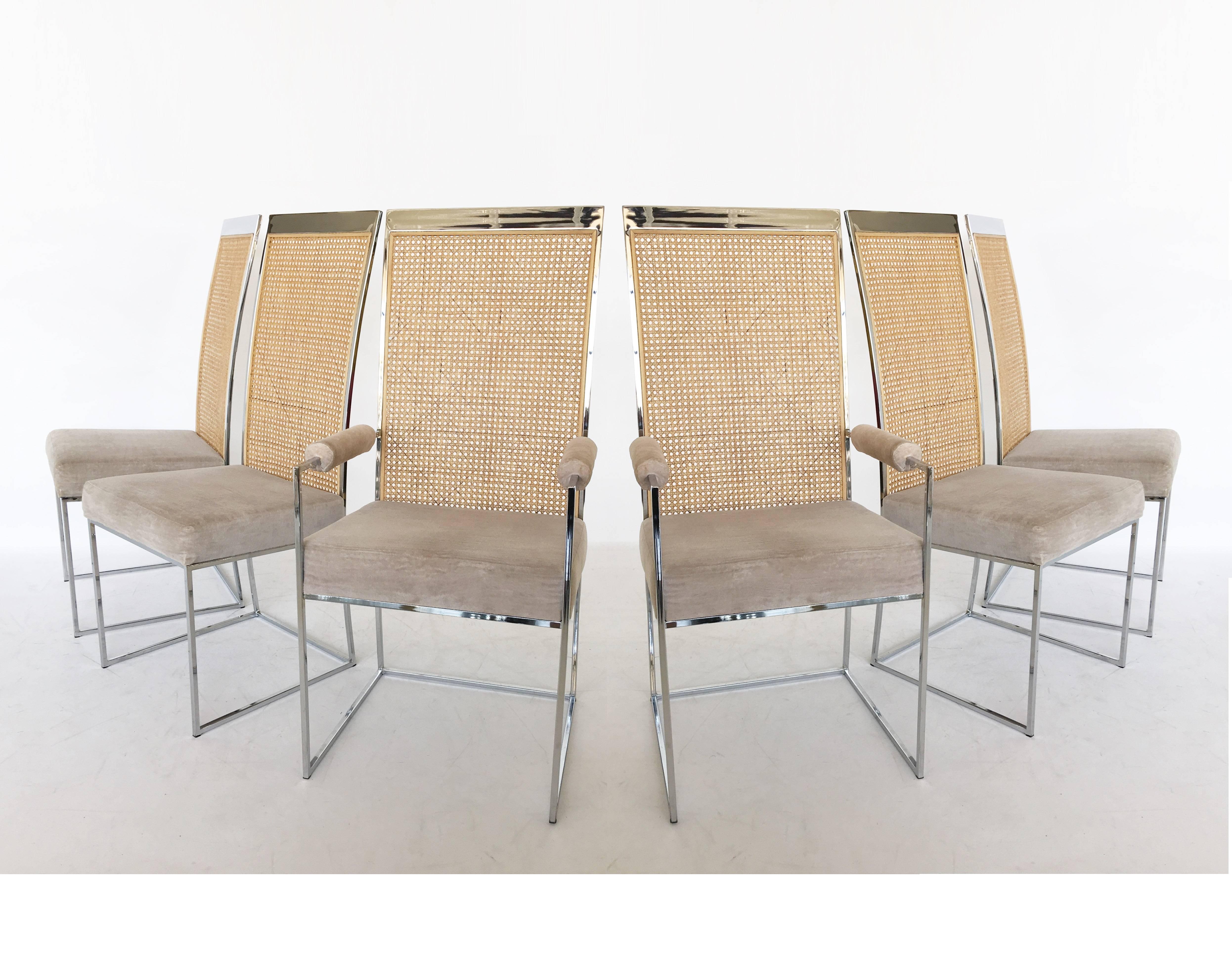 This gorgeous set of six Milo Baughman dining chairs was manufactured for Thayer Coggin. The simplistic chrome frame is softened by the original caned back. The two end chairs have upholstered arms.