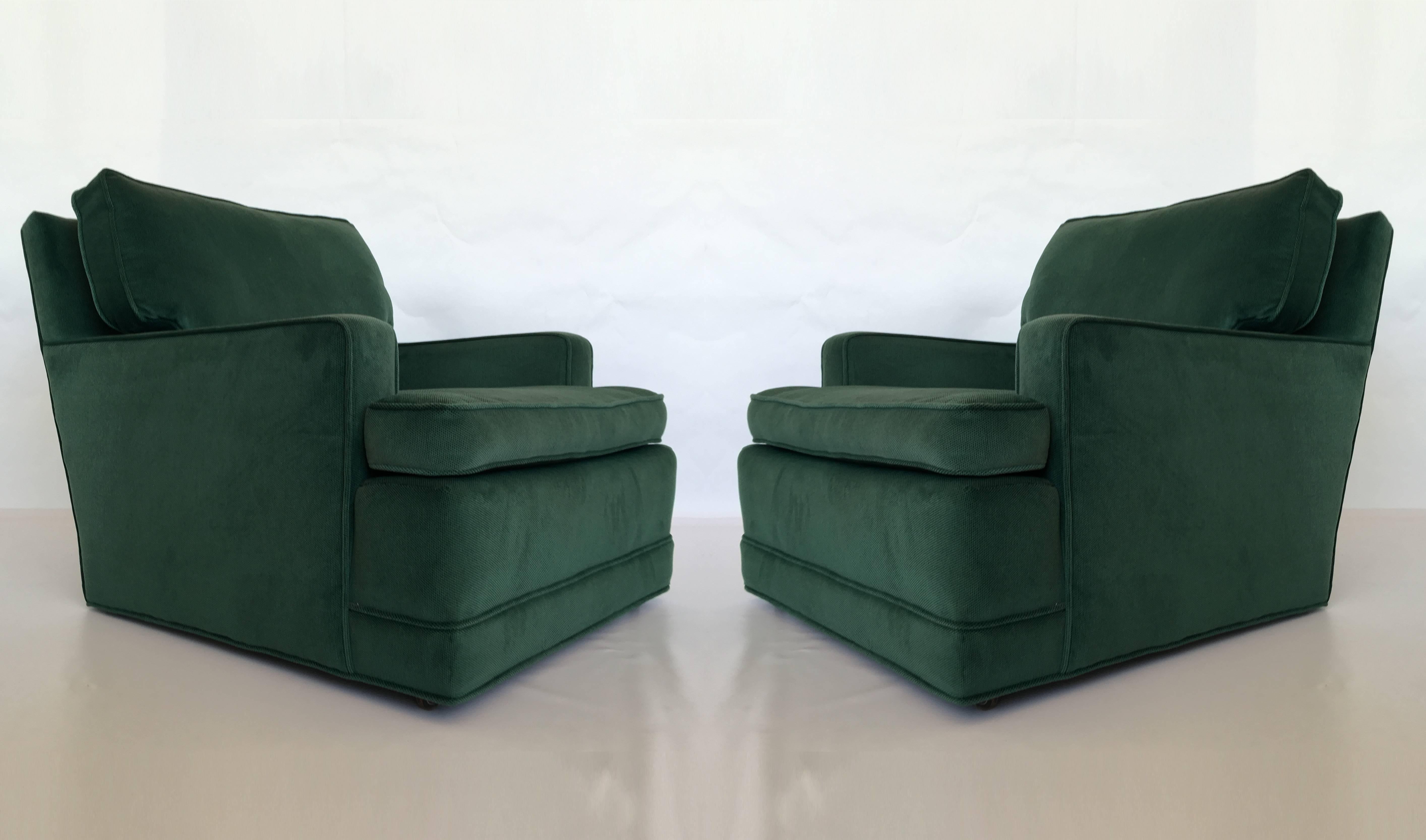 A beautiful pair of green Seniah chairs in the style of Billy Haines. Upholstered ledge-back chairs on casters, the loose seats and back cushions are filled with the down and feather. Comfortable and distinct, circa 1950s. They are in great original