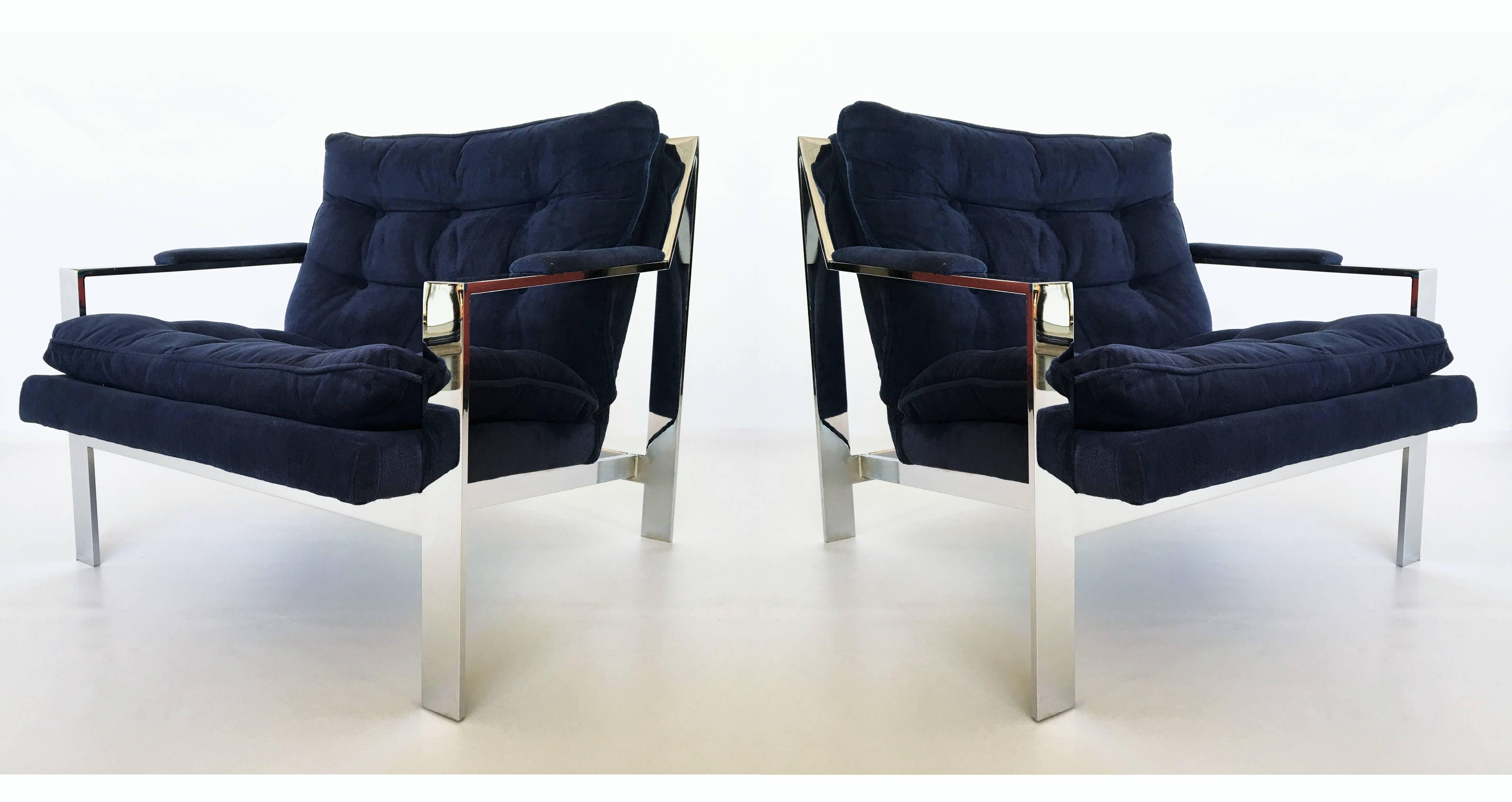 Cy Mann chrome lounge #232 

Beautiful tufted and polished chromed steel modernist lounge chair by Cy Mann of New York. Very similar to Milo Baughman, sculpted chrome frame except this one has the "sled" arms. Upholstered in navy blue