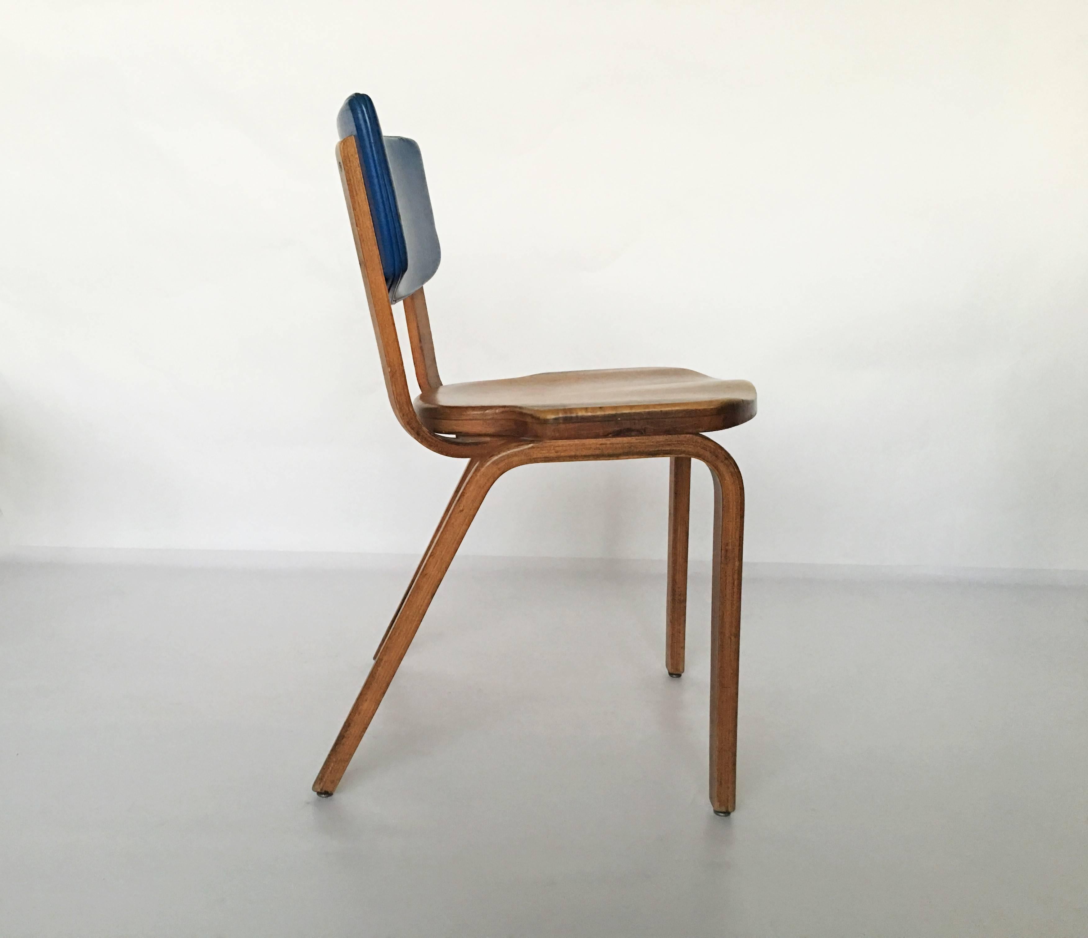 Iconic set of eight Thonet dining chairs in original condition. These are very early examples of this design. Bent plywood chairs with back rests covered in a blue vinyl. Worn, stained and small tears (see picture) but structurally solid with no