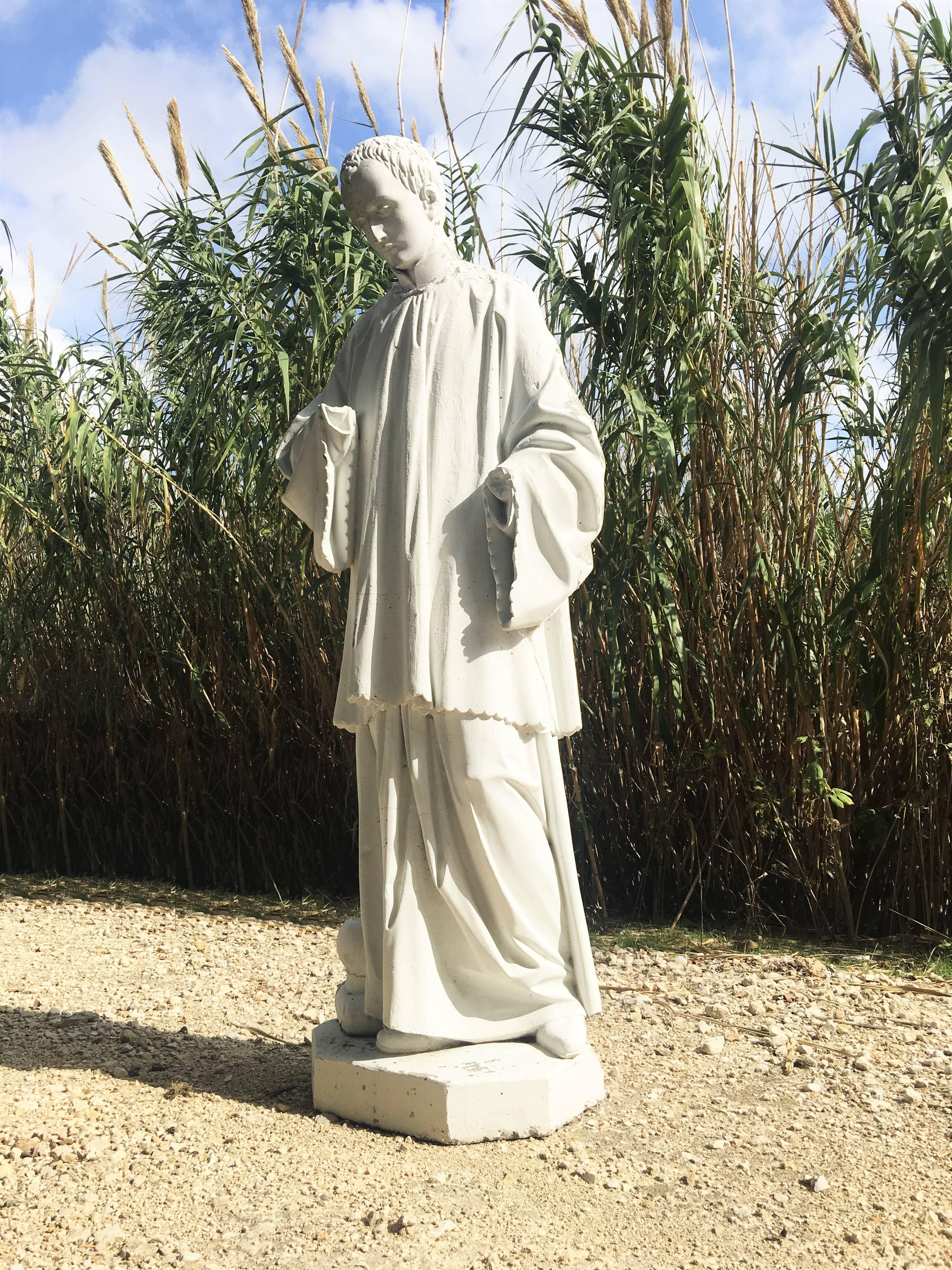 An elegant and highly detailed late 18th century lifesize carved stone statue from a Monastery in France. Finely sculpted statue and is raised by a octagonal base. Draped in classical attire.

Would make beautiful addition to your garden or the