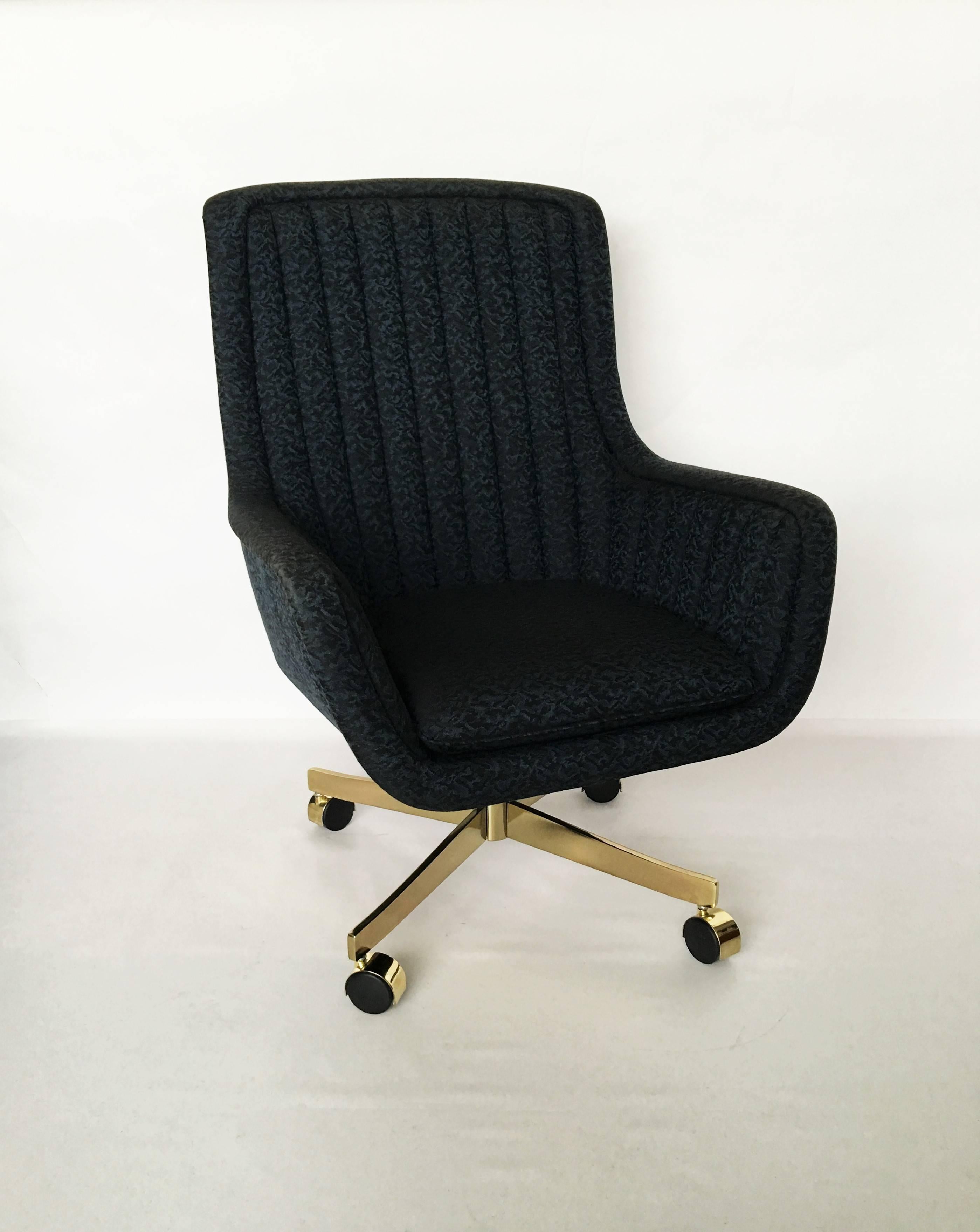 Eight high-quality swivel chairs designed by Ward Bennett, American, 1917-2004 for Brickel Associates, circa 1984. In excellent vintage condition, these chairs are incredibly comfortable and have beautifully stitched. They're on four extended brass