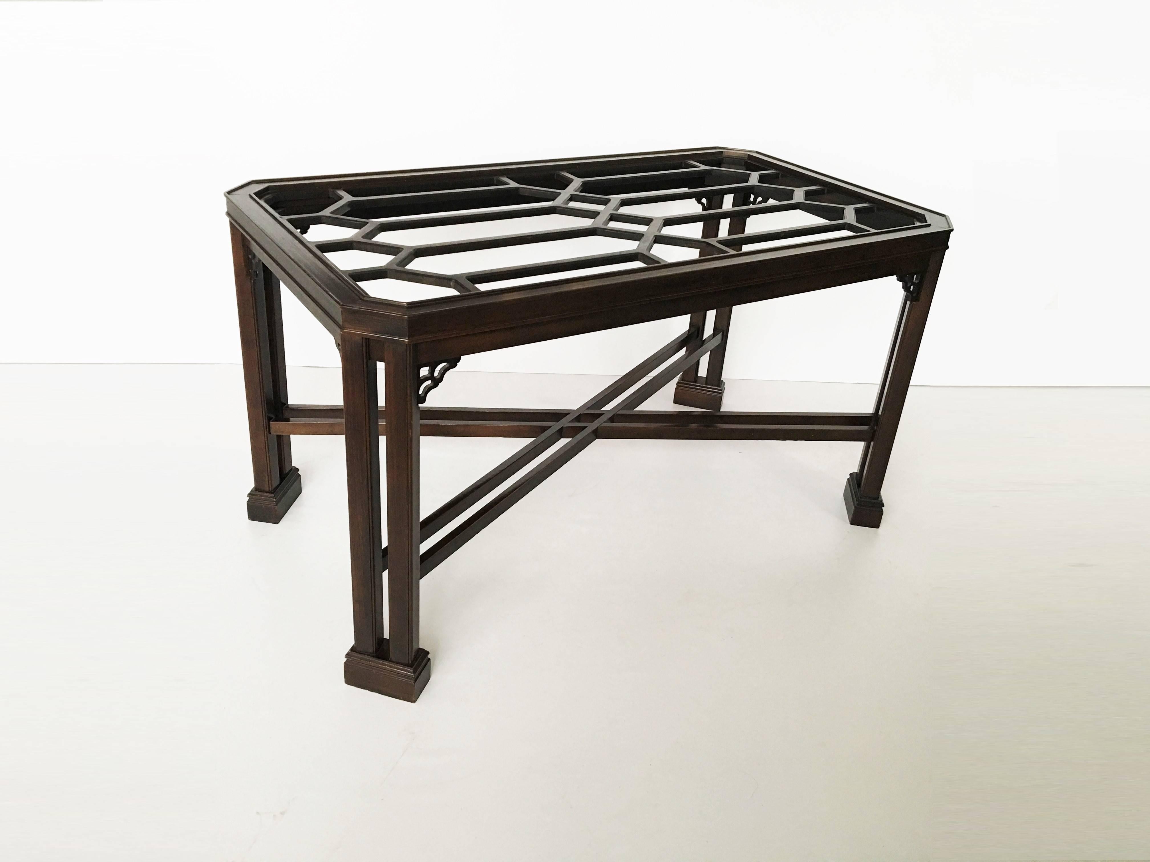Wonderful Chinese Chippendale dining table.

Table base size: 29.5 in. Height x 55.5 in. Width x 30.5 in. Depth 
Glass top size: 78 in. Length x 46 in. Width x 3/4 in. Thick 