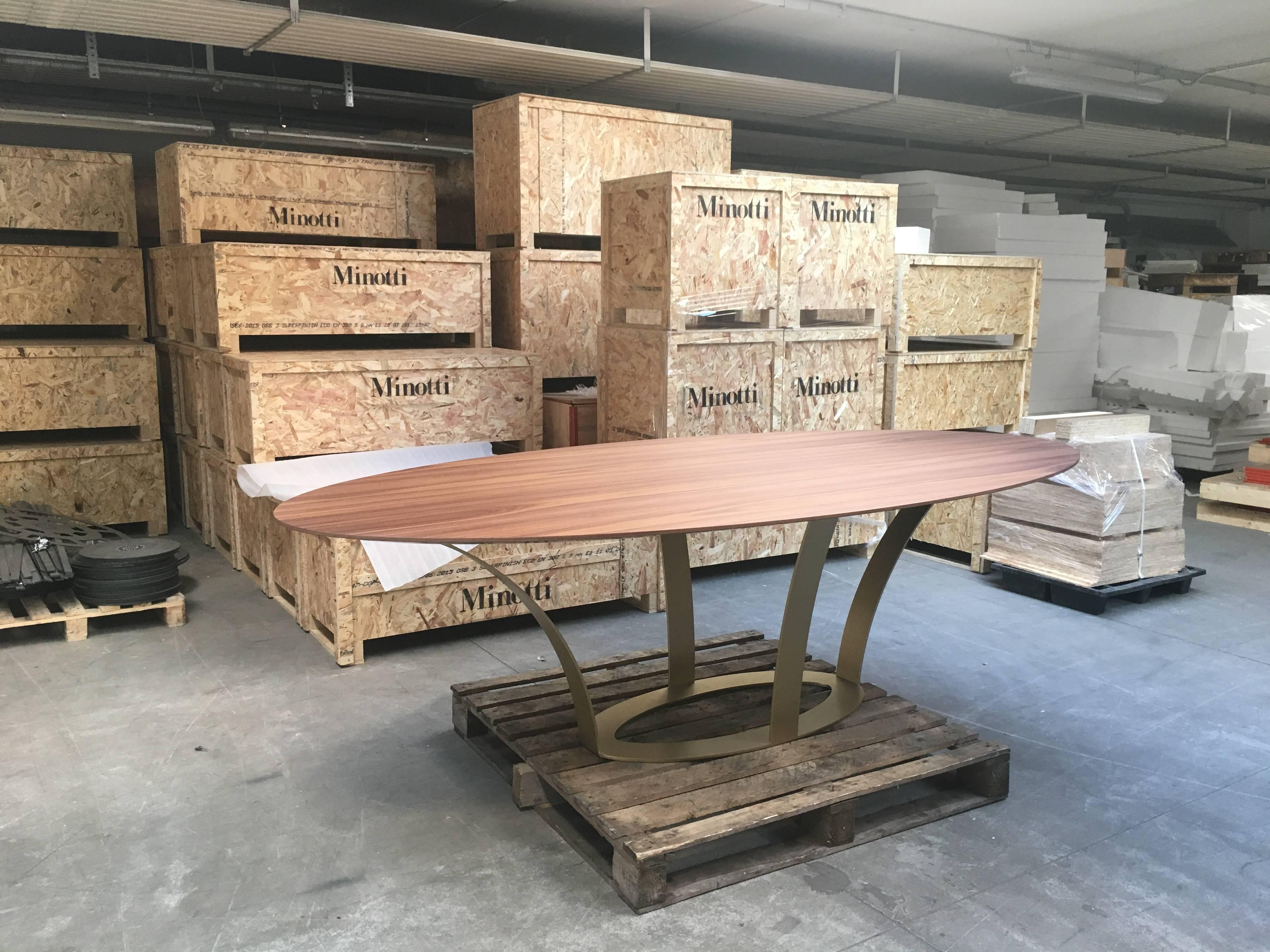 Powder-Coated Modern Dining Table, Oval Walnut Finishing and Steel Base with Brass Finishing For Sale