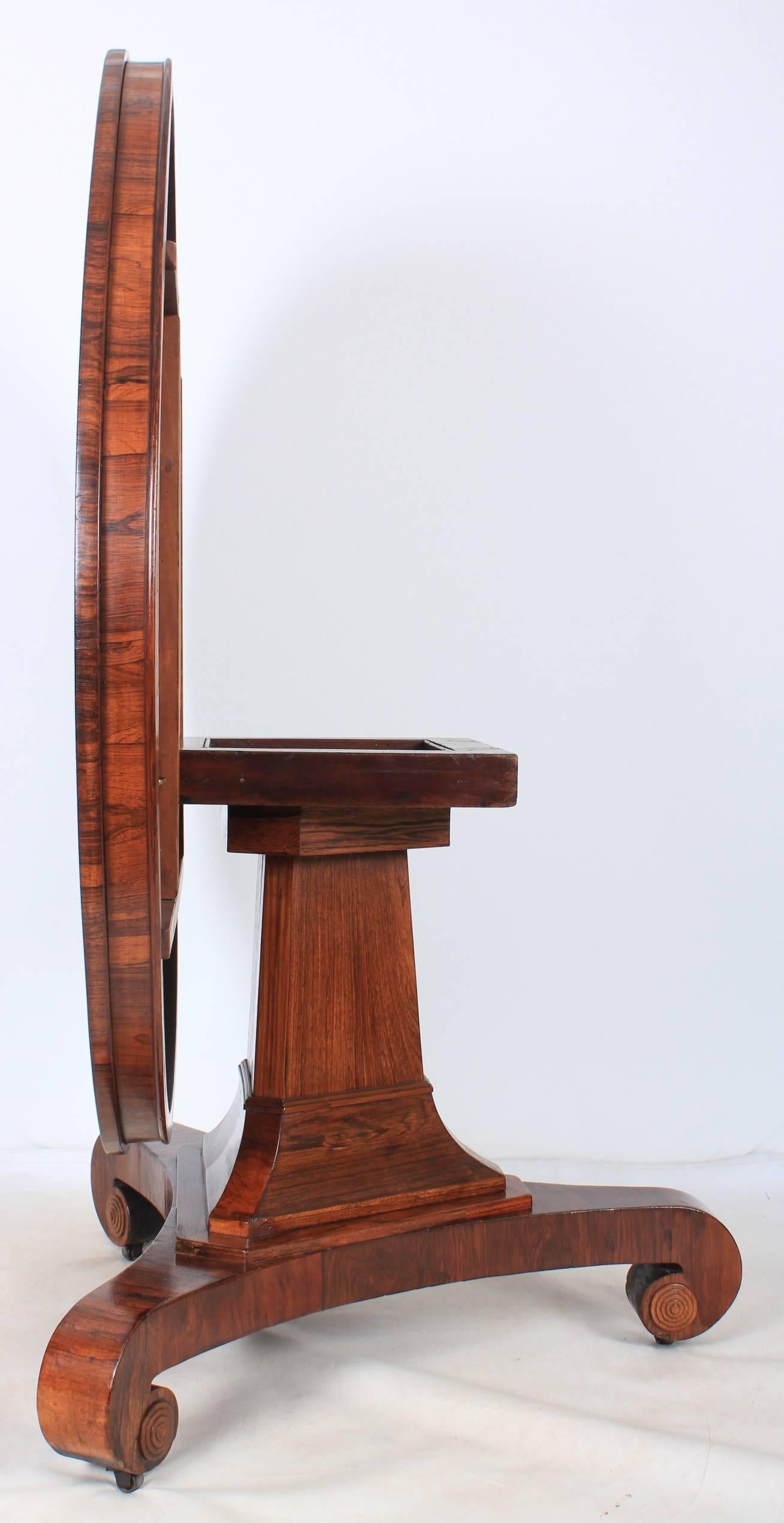 English, circa 1810.
In great condition, ready for use in the home.
Boasting a great colour and patina, with a removable tilt-top, held in place with by two screw pins and a latch.
On a lovely triform base, with three scroll feet with decorative