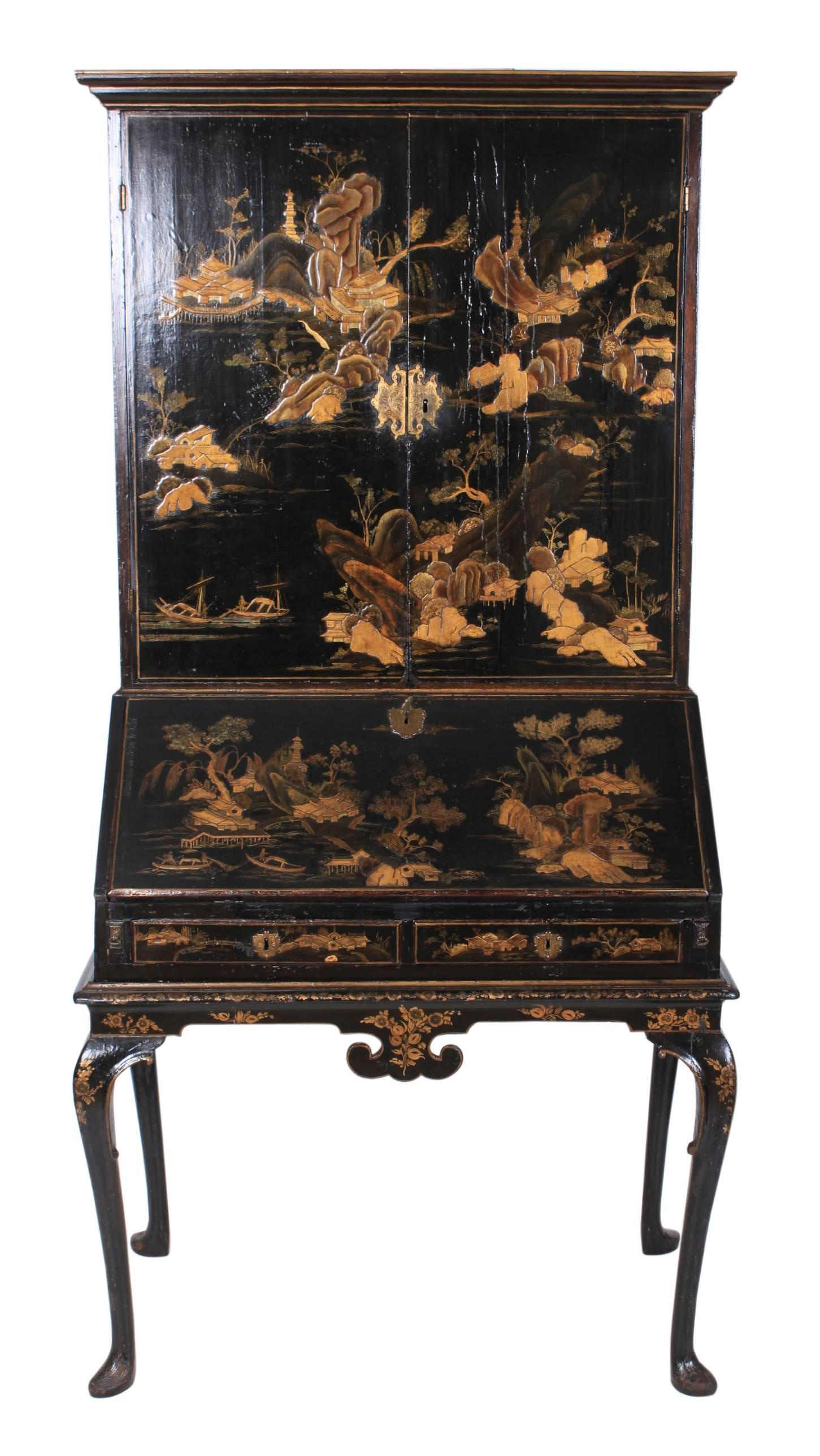 English, circa 1710.
This early bureau bookcase is in great original condition and very rare.
Corniced top over two cupboard doors which open to reveal two removable adjustable shelves and two small drawers.
The doors are beautifully painted in