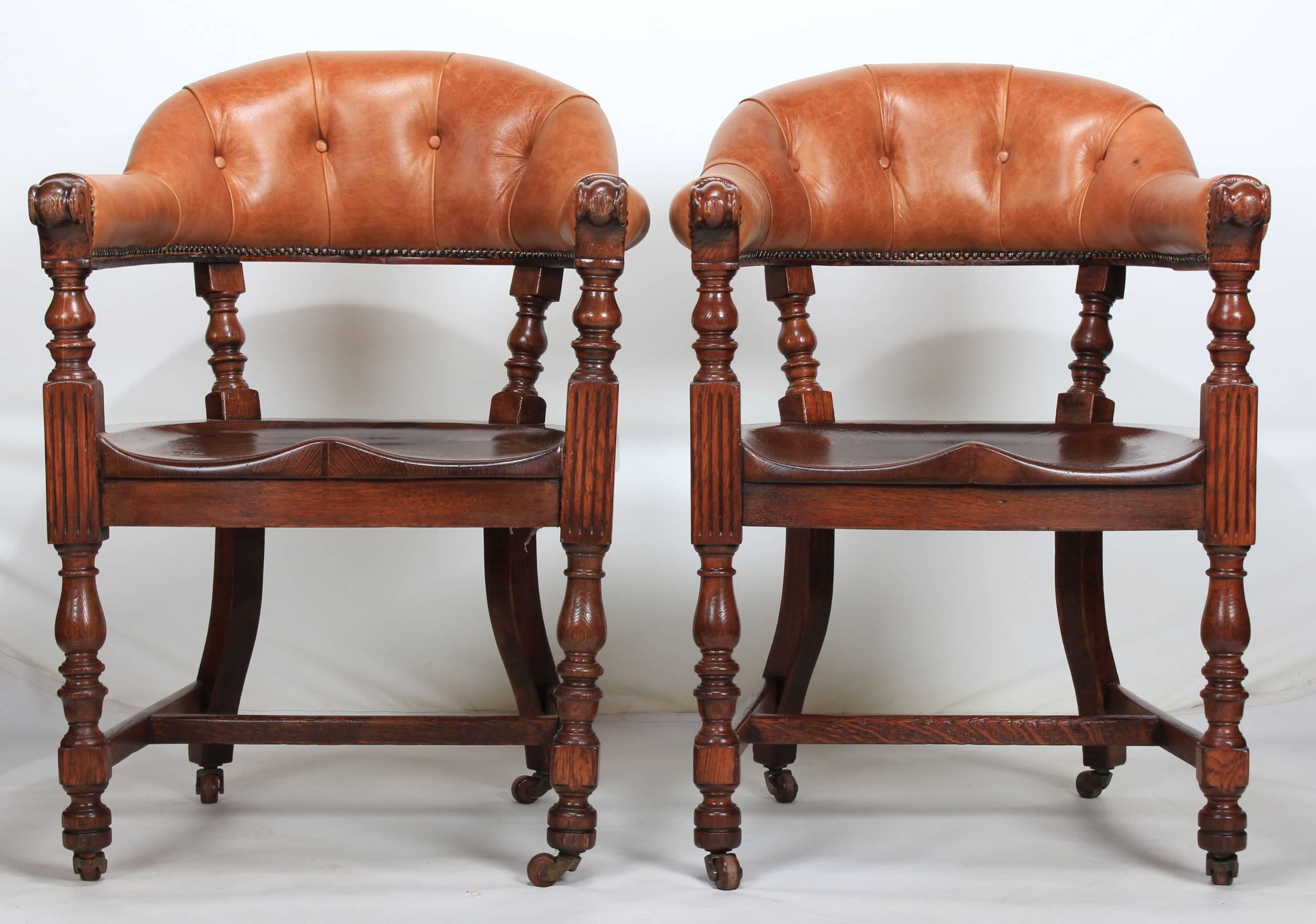 English, circa 1880.
These desk chairs have been recently releathered and are offered in showroom condition.
In the style of Jas Scholbred, these chairs consist of solid oak shaped seats, on turned legs with brass casters and a shaped buttoned