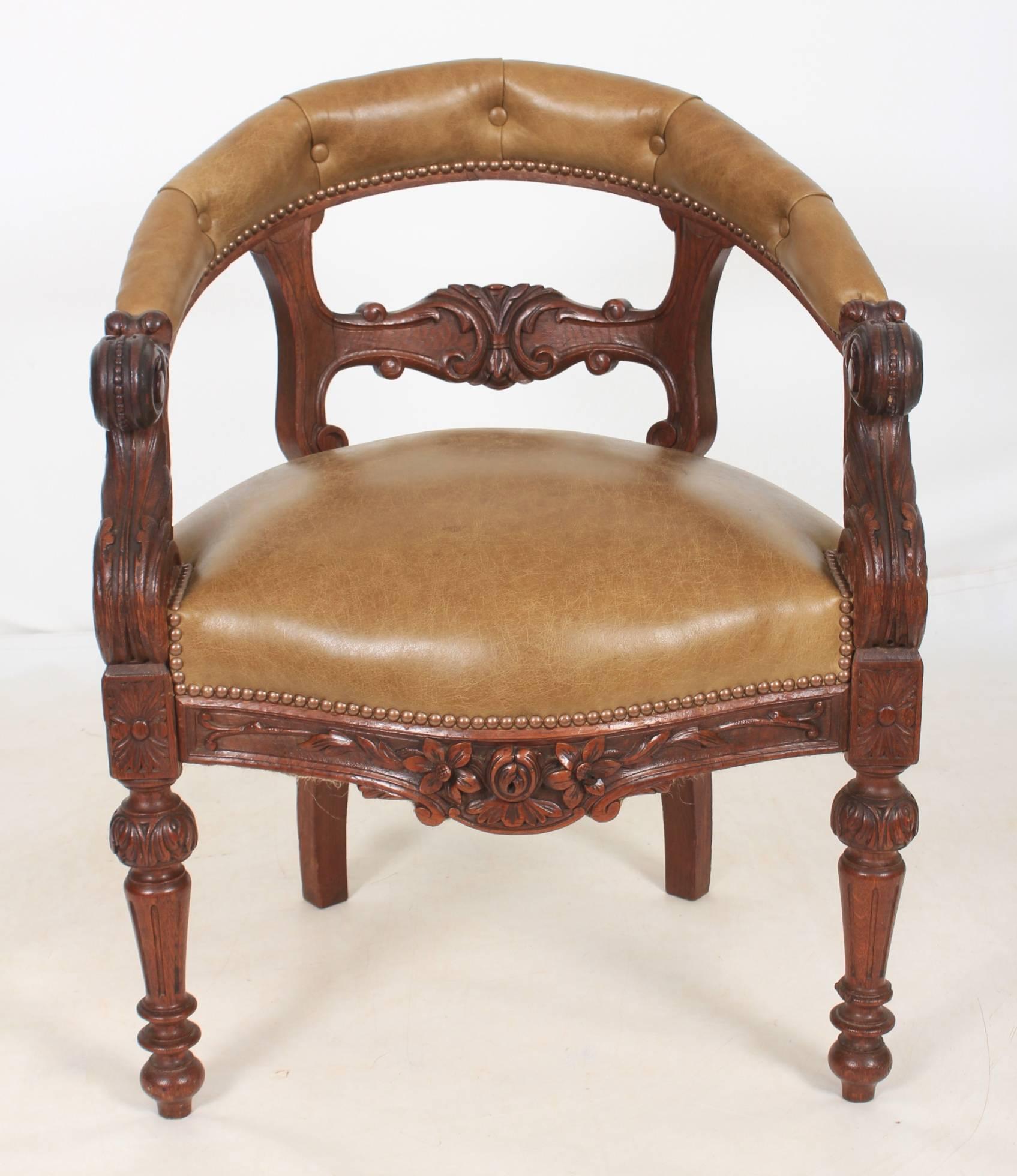 French, circa 1880.
A gorgeous French oak desk chair in good condition. Beautifully carved to a high standard, with leather upholstered and buttoned back rest and smooth leather seat with brass studded trim.
On lovely fluted legs.
This is not
