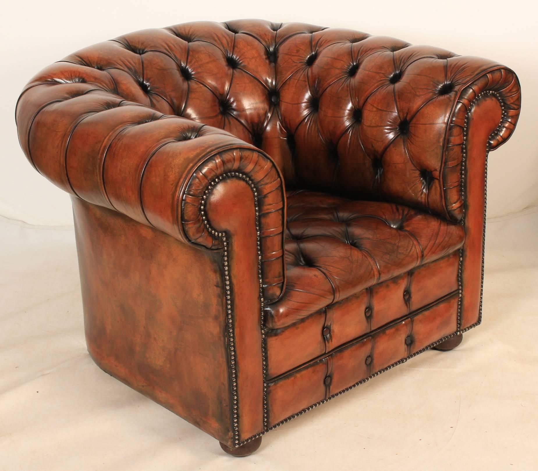 English, circa 1920.
This hand dyed brown leather Chesterfield armchair is offered in showroom condition.
It has a lovely deep buttoned back, arms and seat, with brass studded edging.
On bun feet with casters.
A lovely comfortable chair, ready